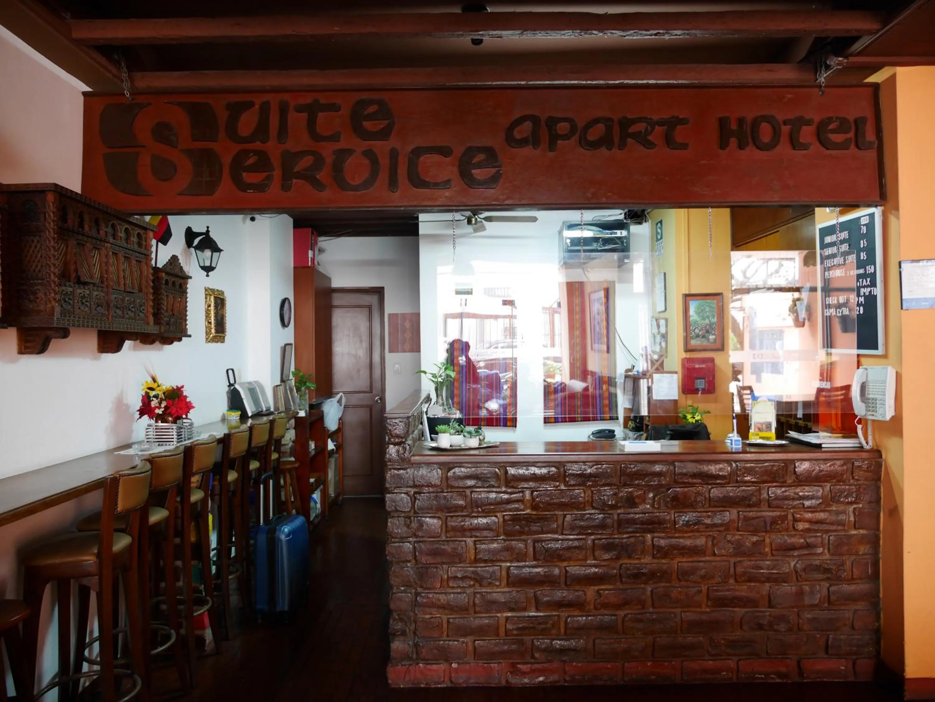 Property logo or sign in Suite Service Apart Hotel