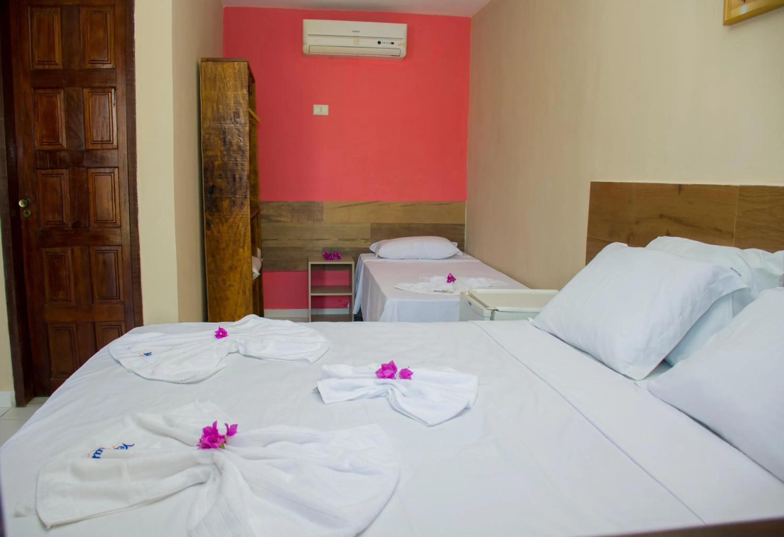 Bed in Pousada Velosmar