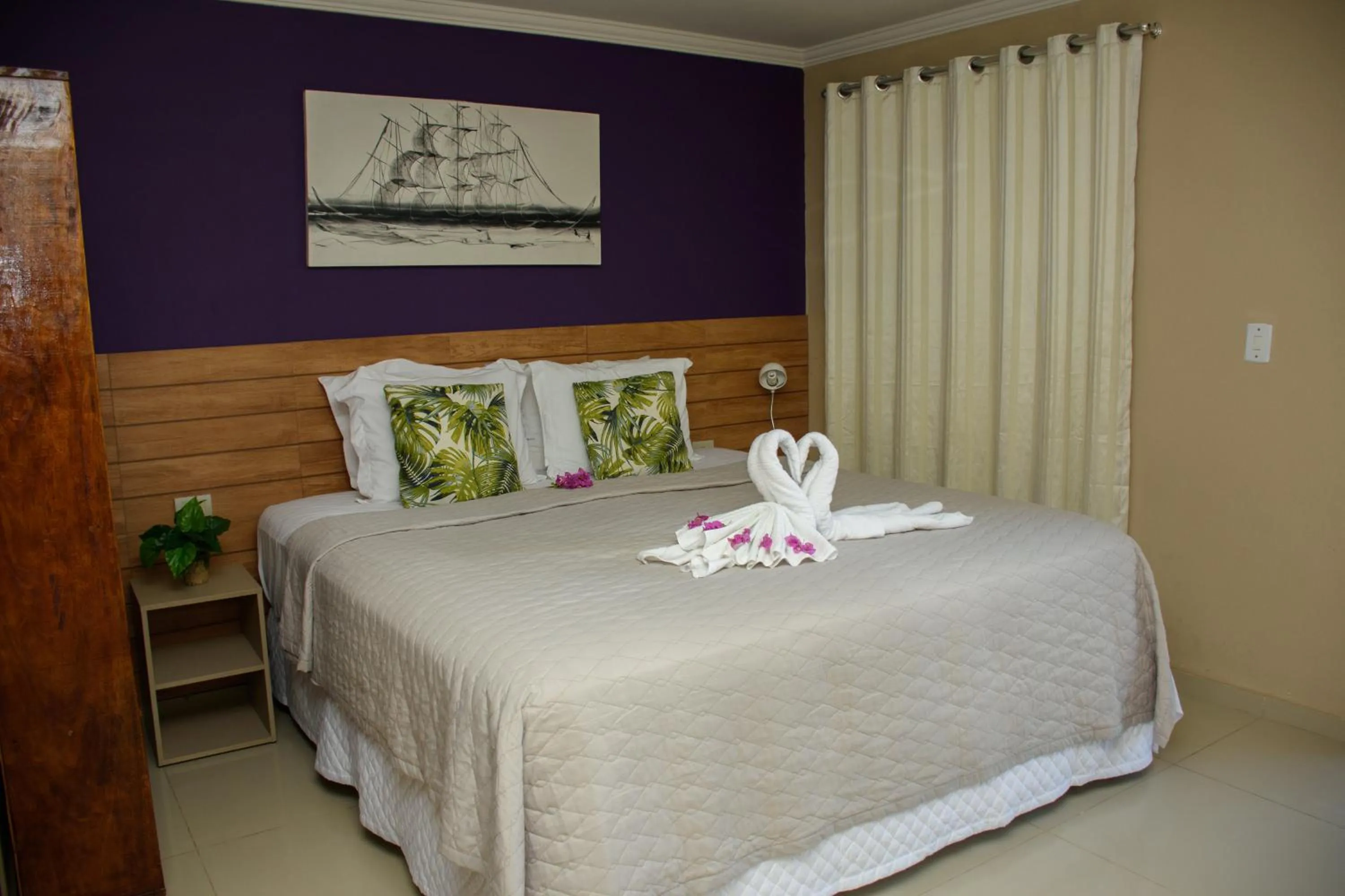 Bed in Pousada Velosmar