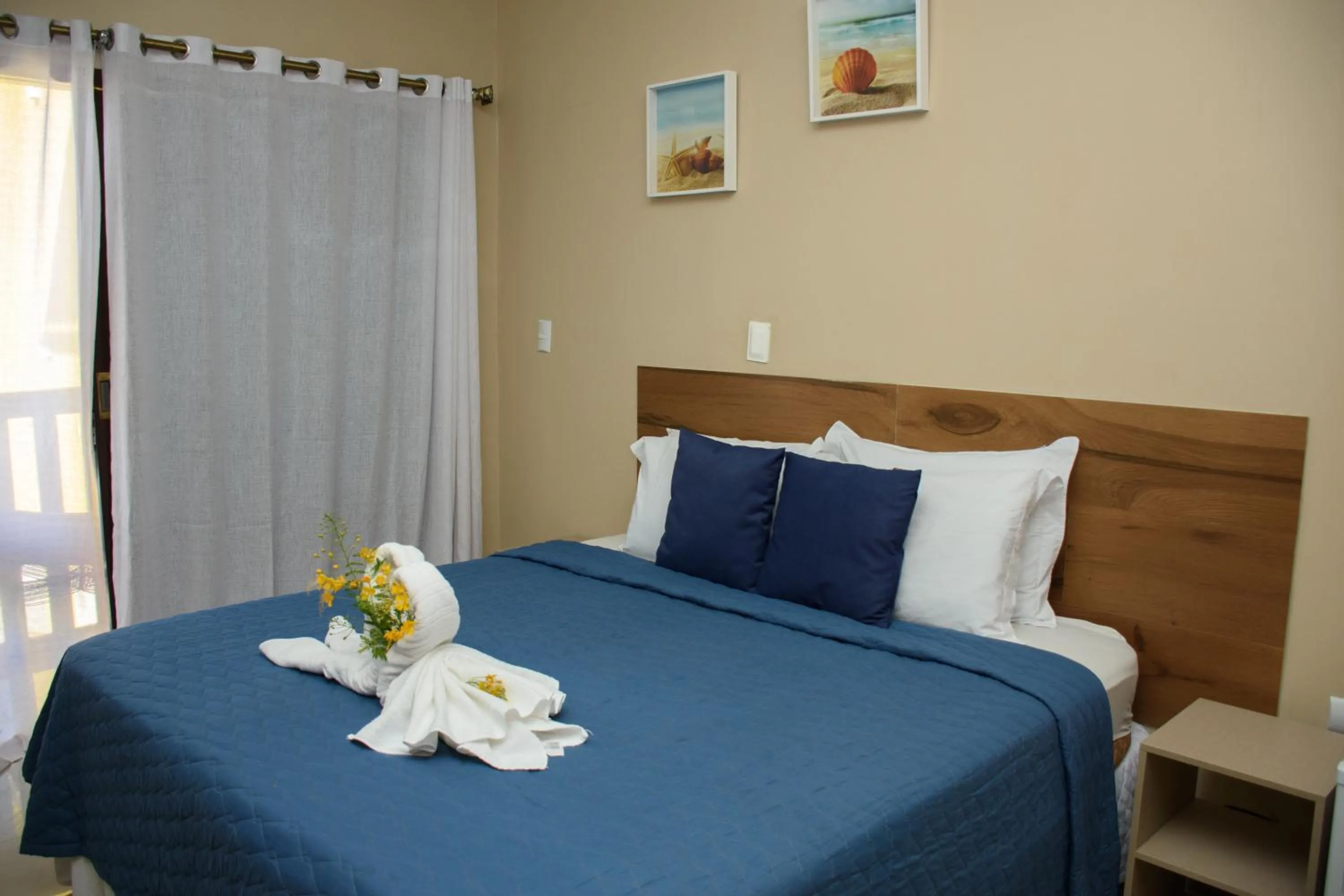 Bed in Pousada Velosmar