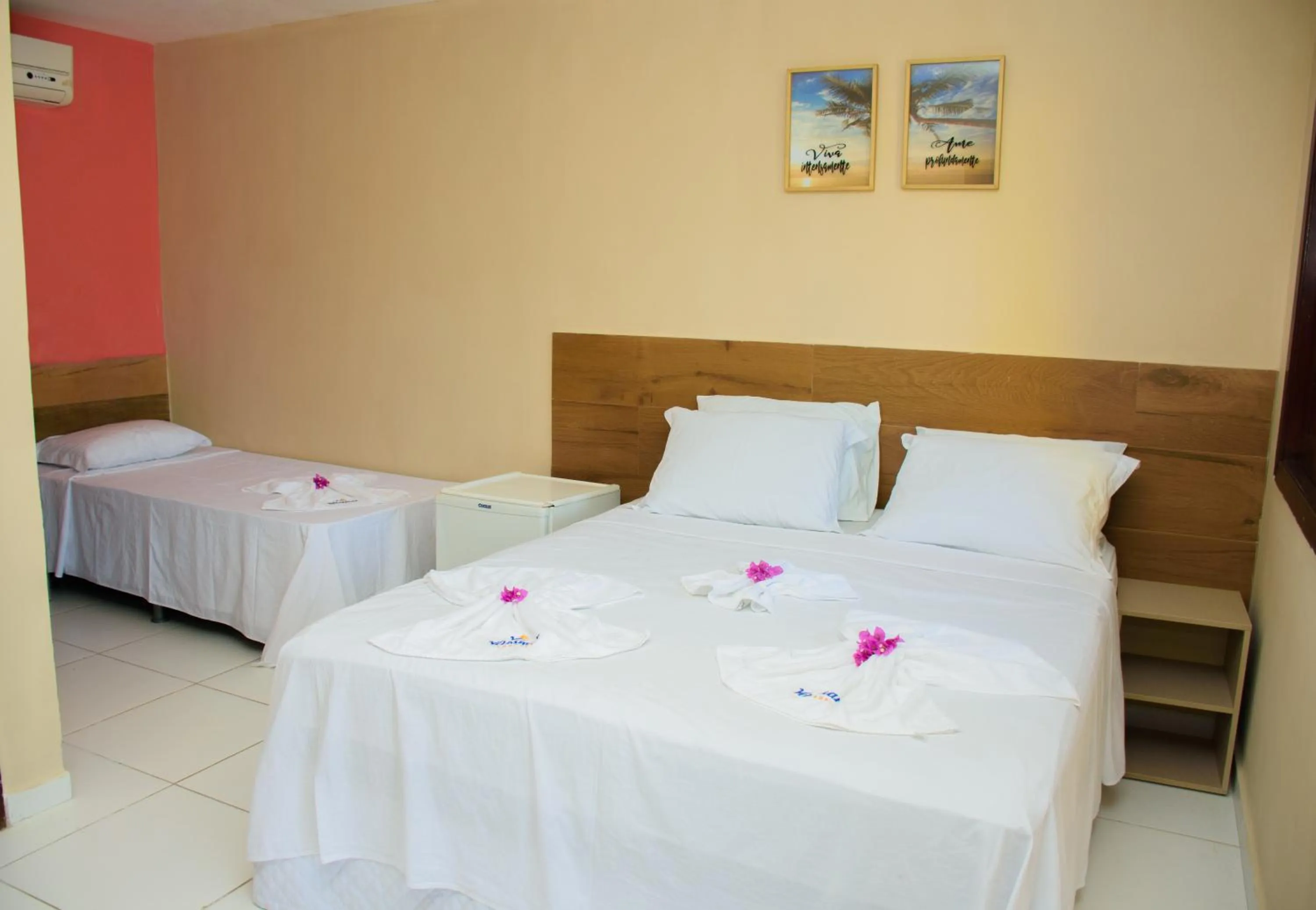 Bed in Pousada Velosmar