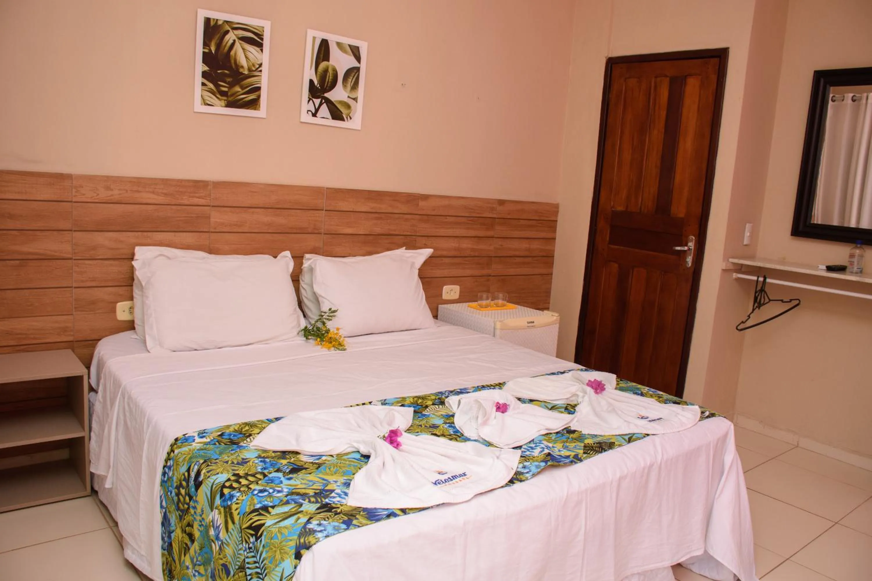 Bed in Pousada Velosmar