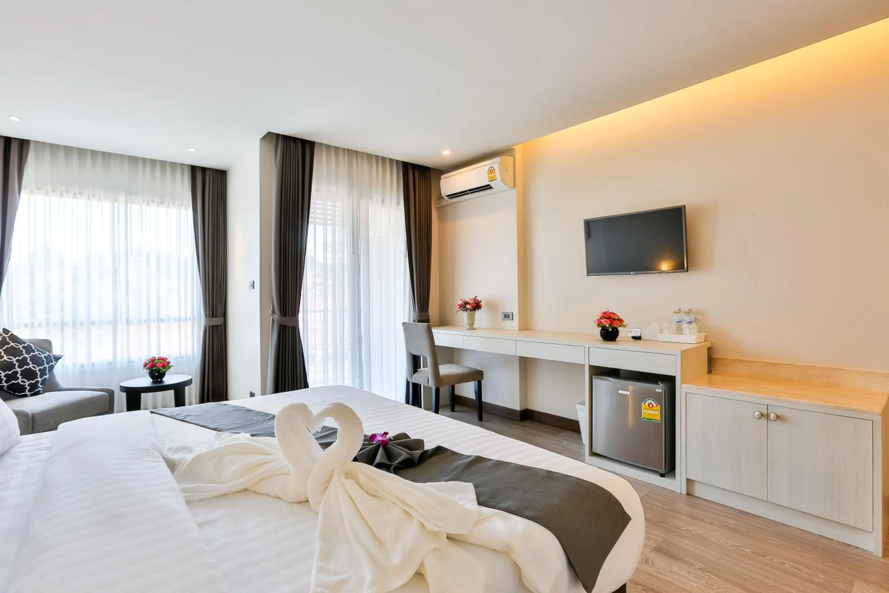 Photo of the whole room, Bed in Rung Aroon Hotel By Le Siri