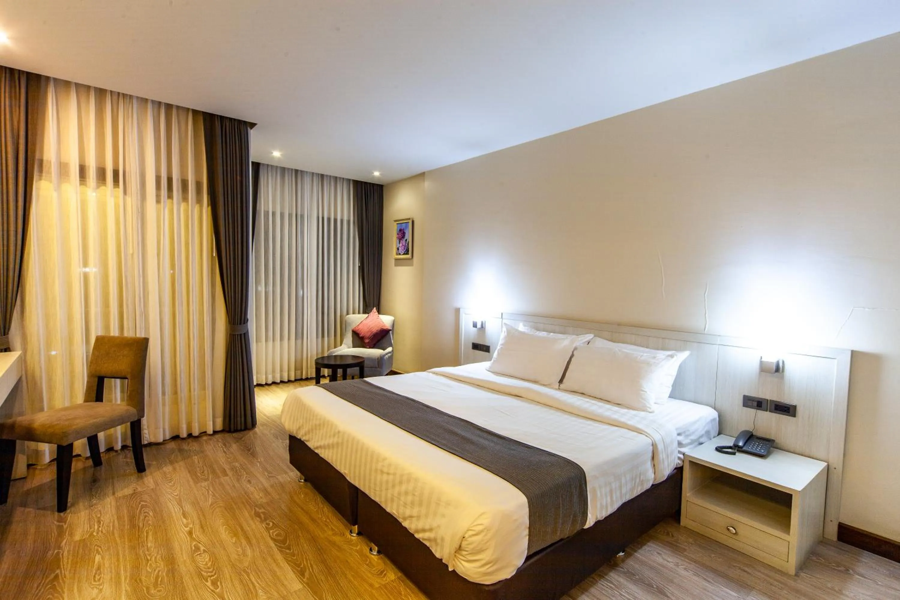 Bed in Rung Aroon Hotel By Le Siri