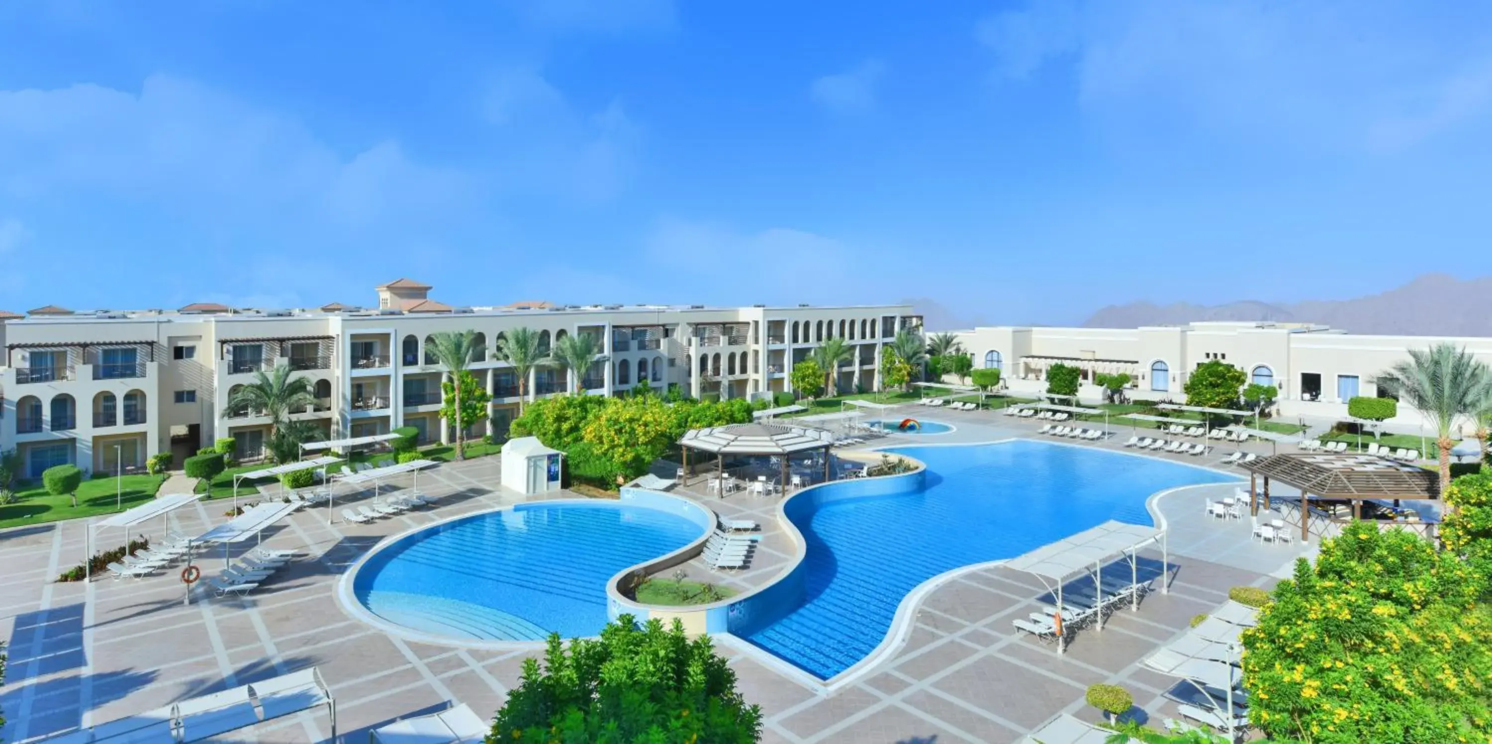 Pool view in JAZ Mirabel Resort Pool view in JAZ Mirabel Resort