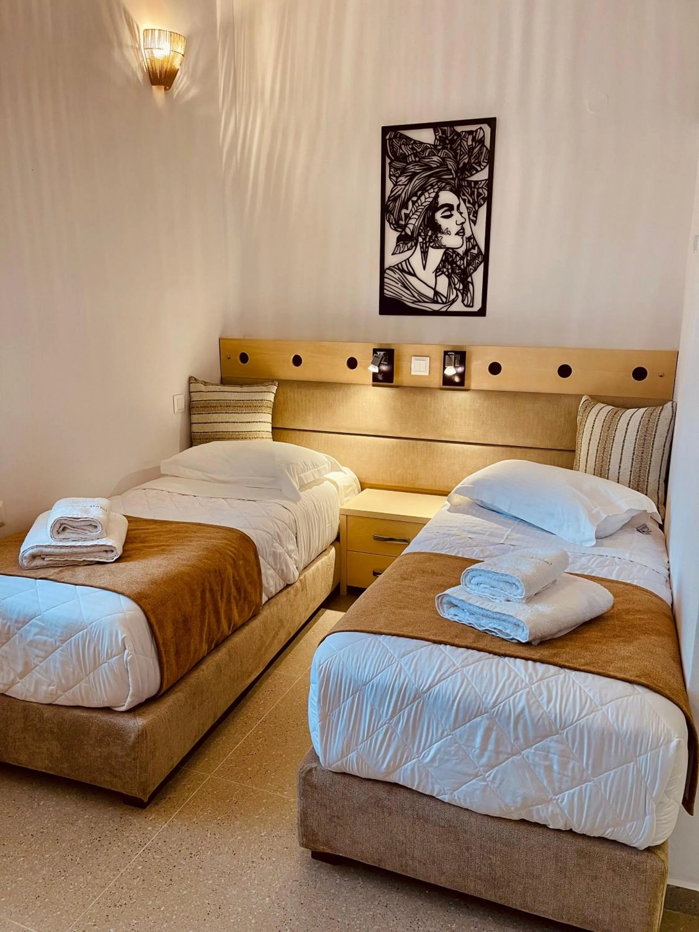 Bed in Semiramis Guesthouse