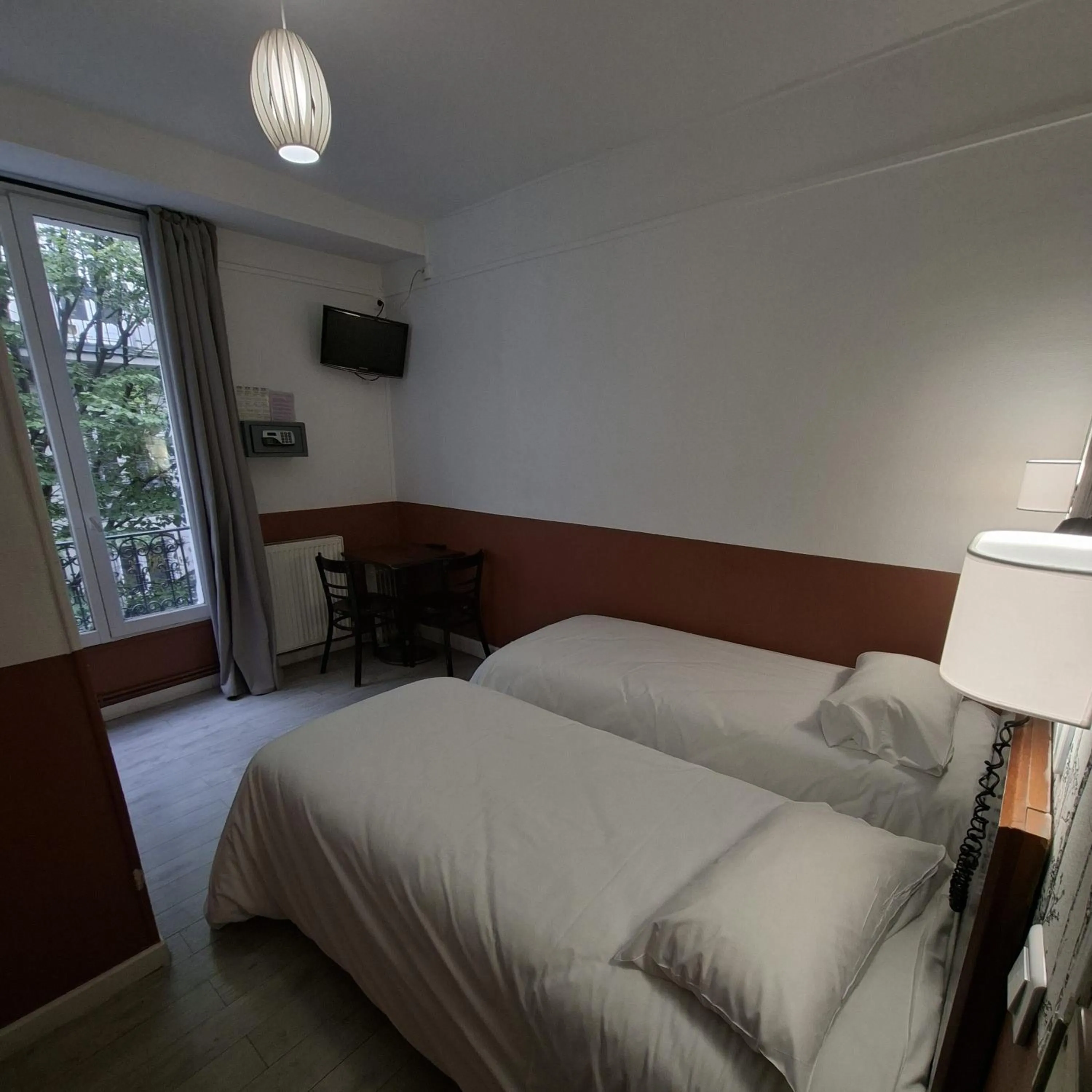 Photo of the whole room, Bed in Caulaincourt Montmartre by Hiphophostels