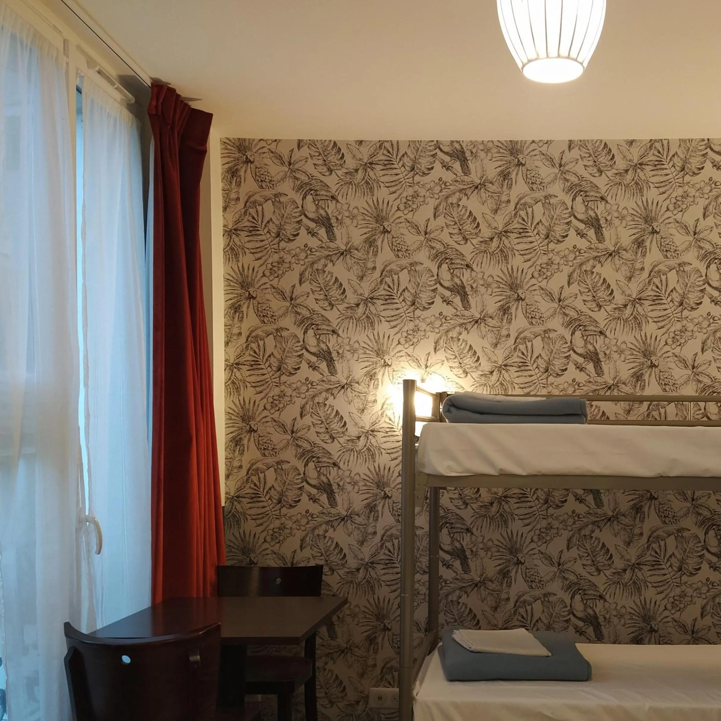 Photo of the whole room, Bed in Caulaincourt Montmartre by Hiphophostels