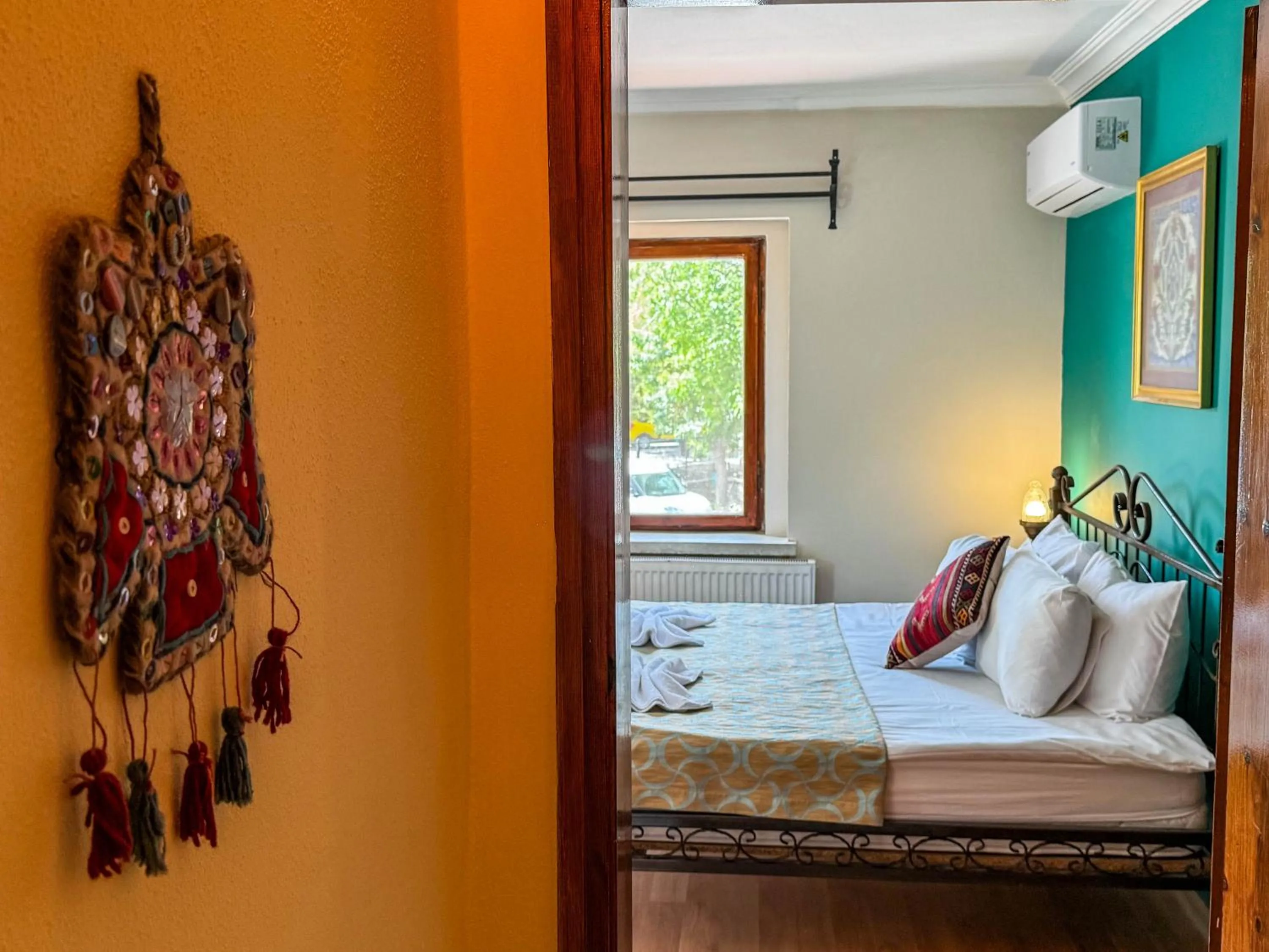 Bed in Nomads Cave Hotel & Rooftop