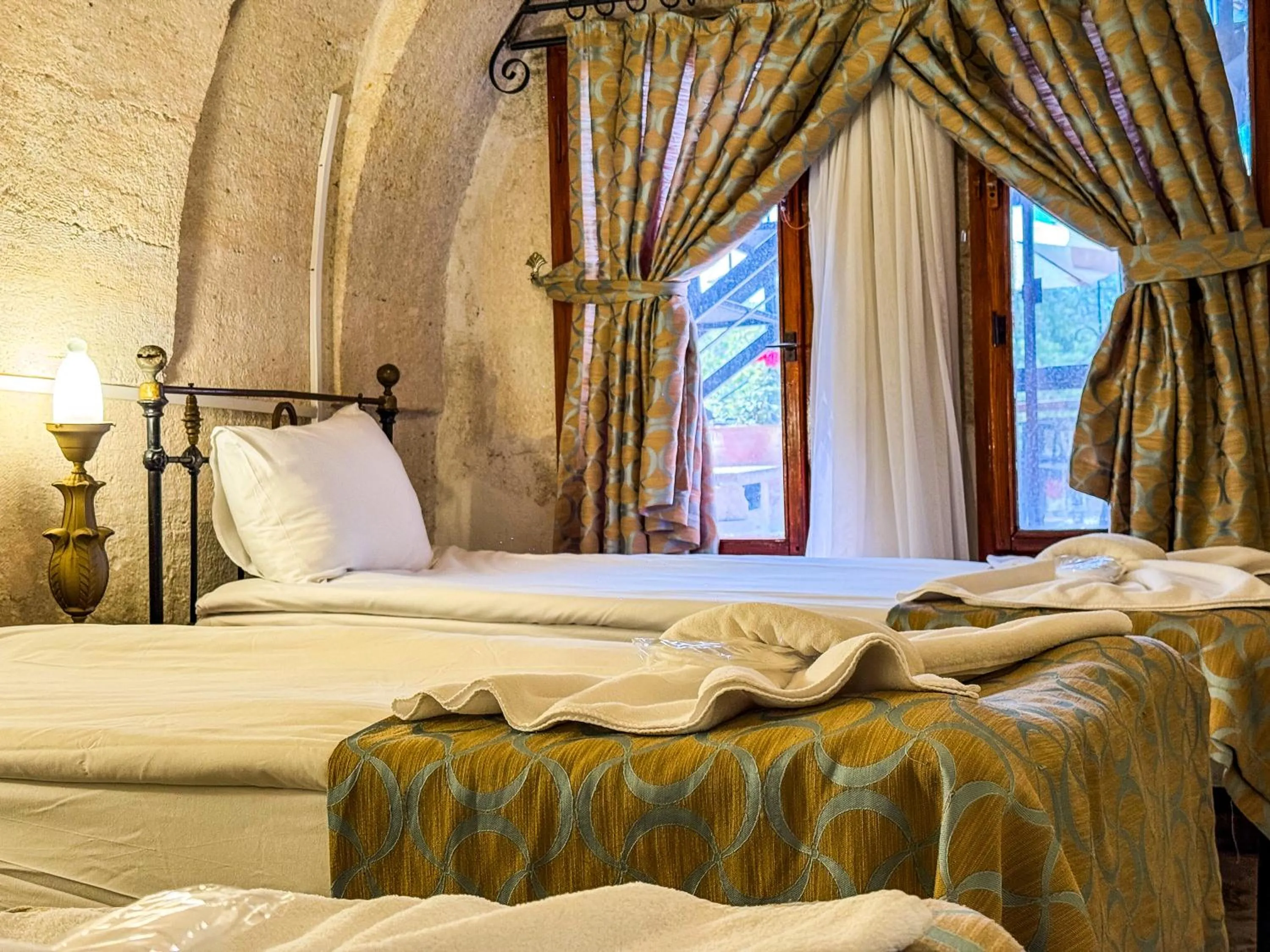 Bed in Nomads Cave Hotel & Rooftop
