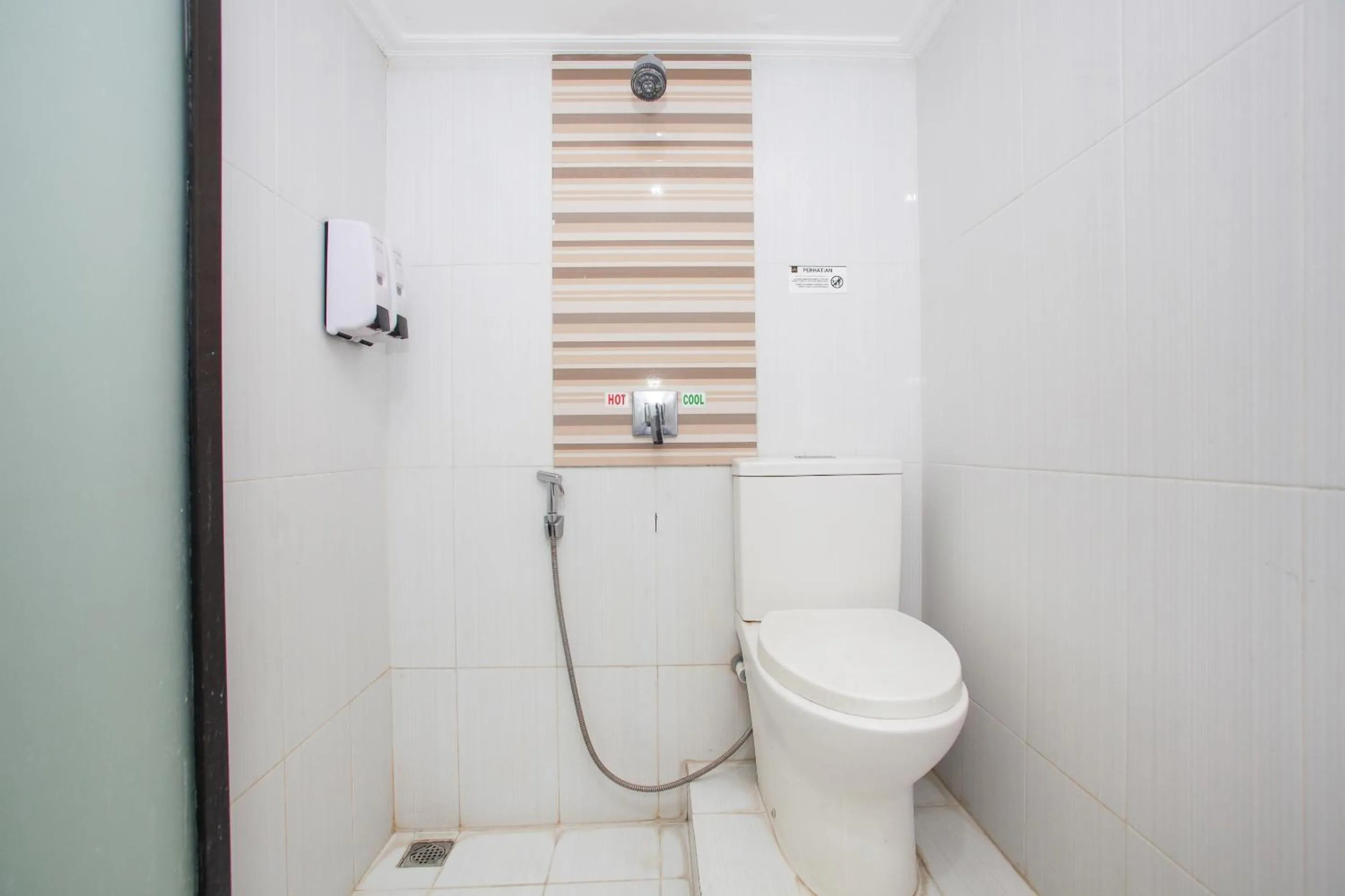 Bathroom in Capital O 887 Green Hill Hotel And Convention Center