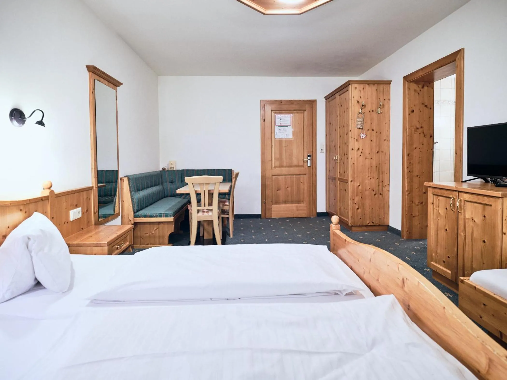 Living room, Bed in Hotel Kirchboden by Alpeffect Hotels