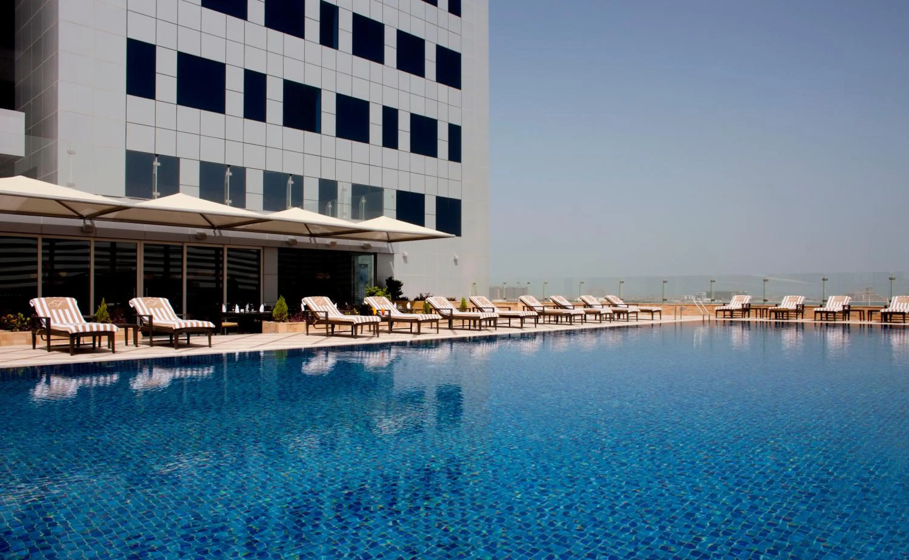 Swimming pool in La Suite Dubai Hotel & Apartments