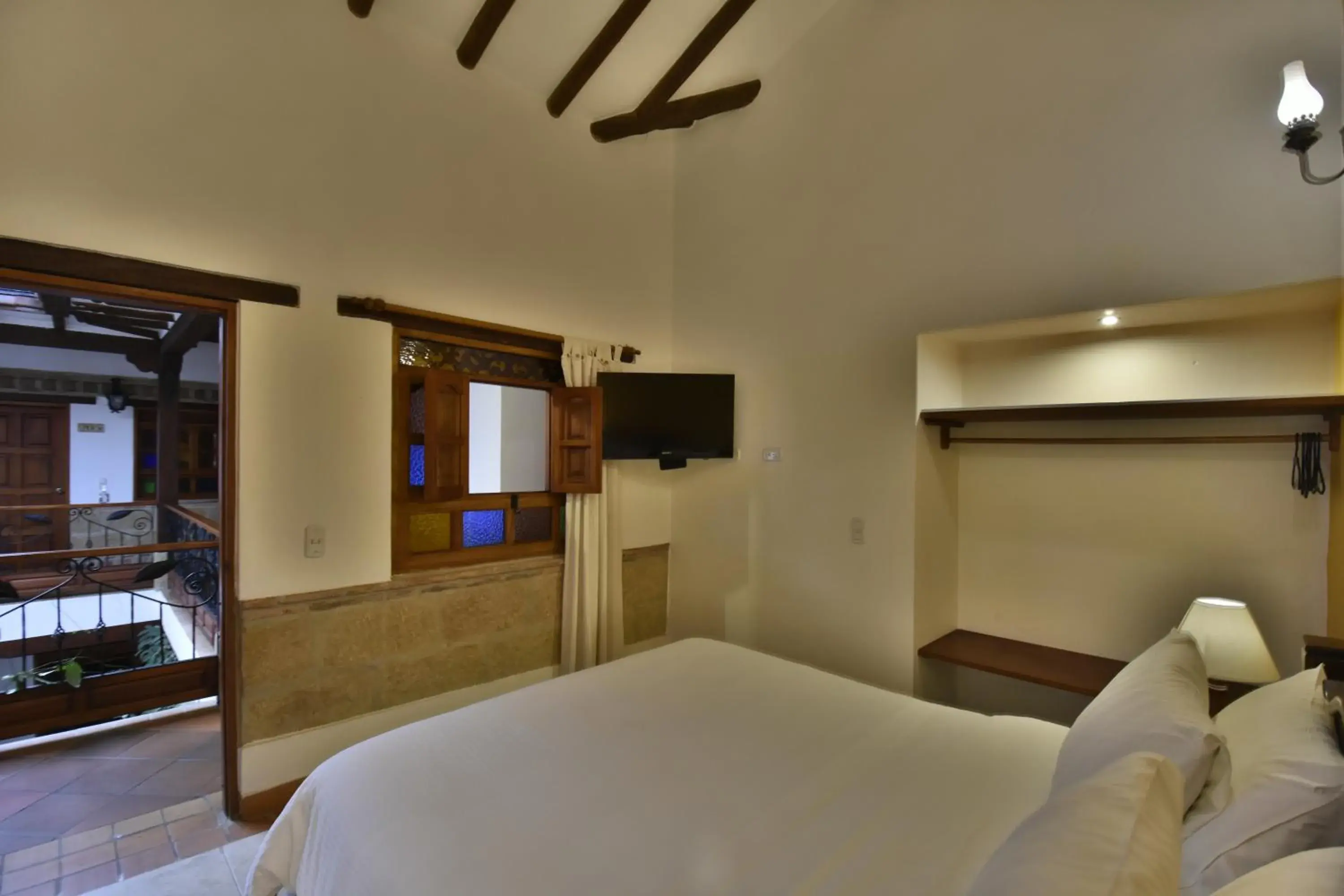 Bed in Hotel Jardines De La Villa Bed in Hotel Jardines De La Villa