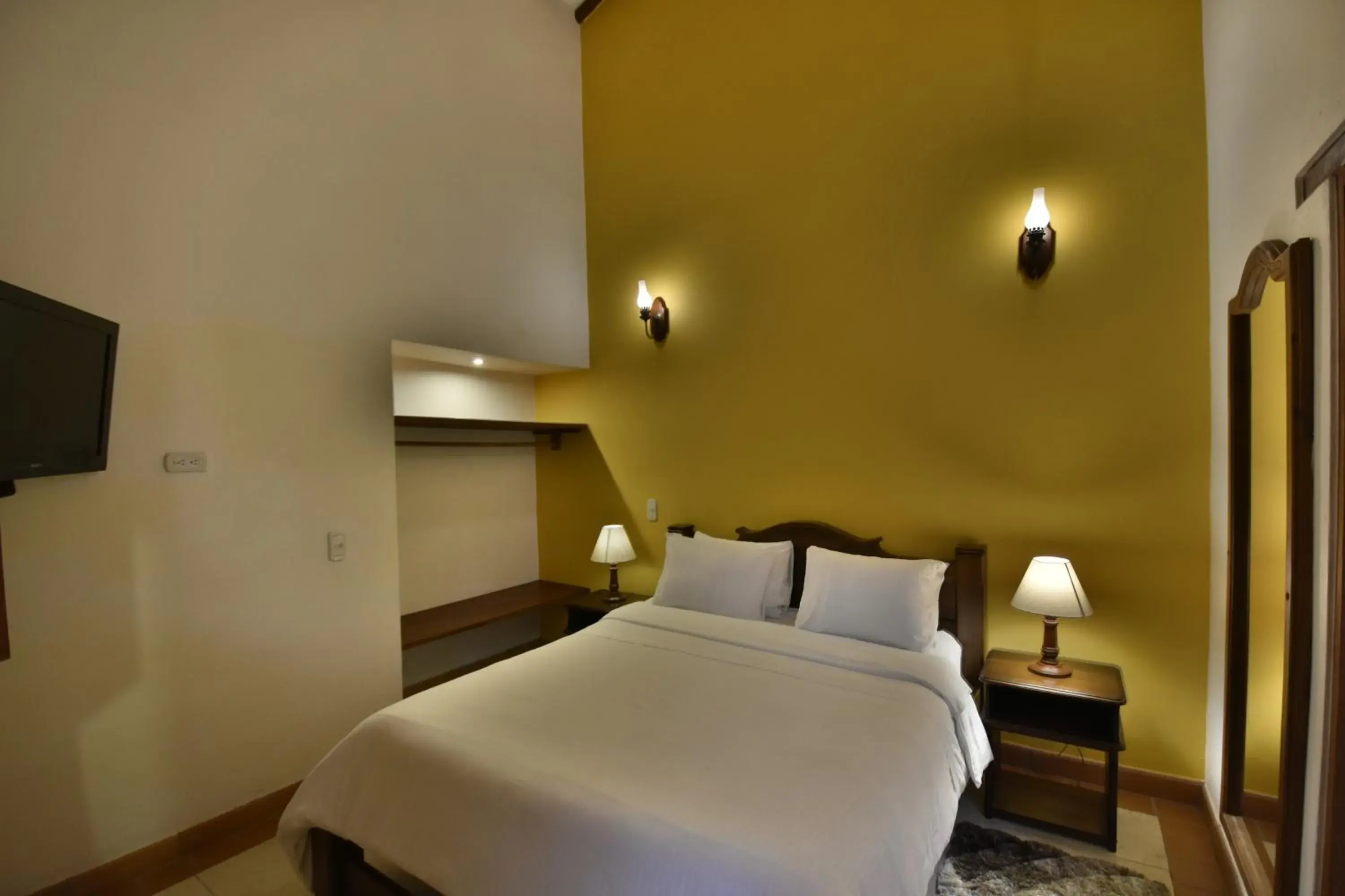 Bed in Hotel Jardines De La Villa Bed in Hotel Jardines De La Villa