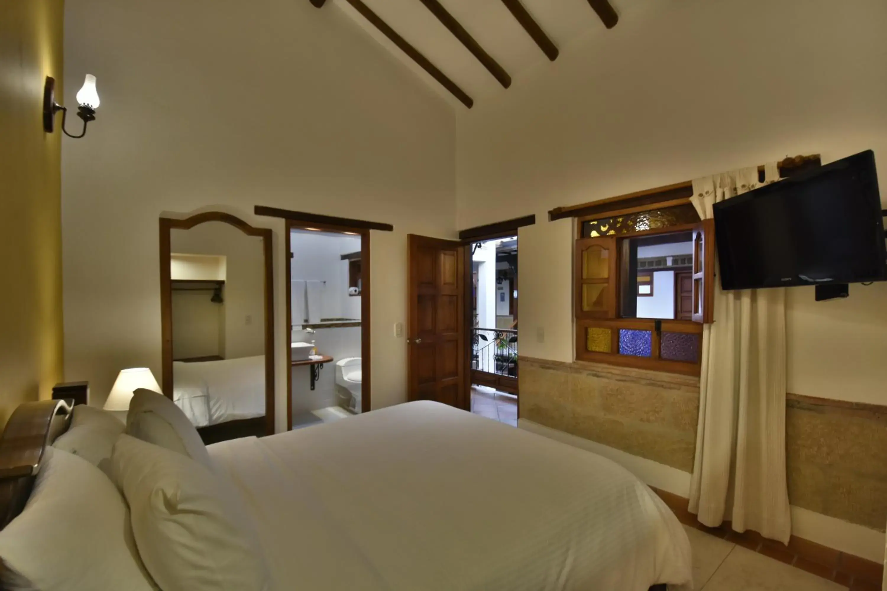 Bed in Hotel Jardines De La Villa Bed in Hotel Jardines De La Villa