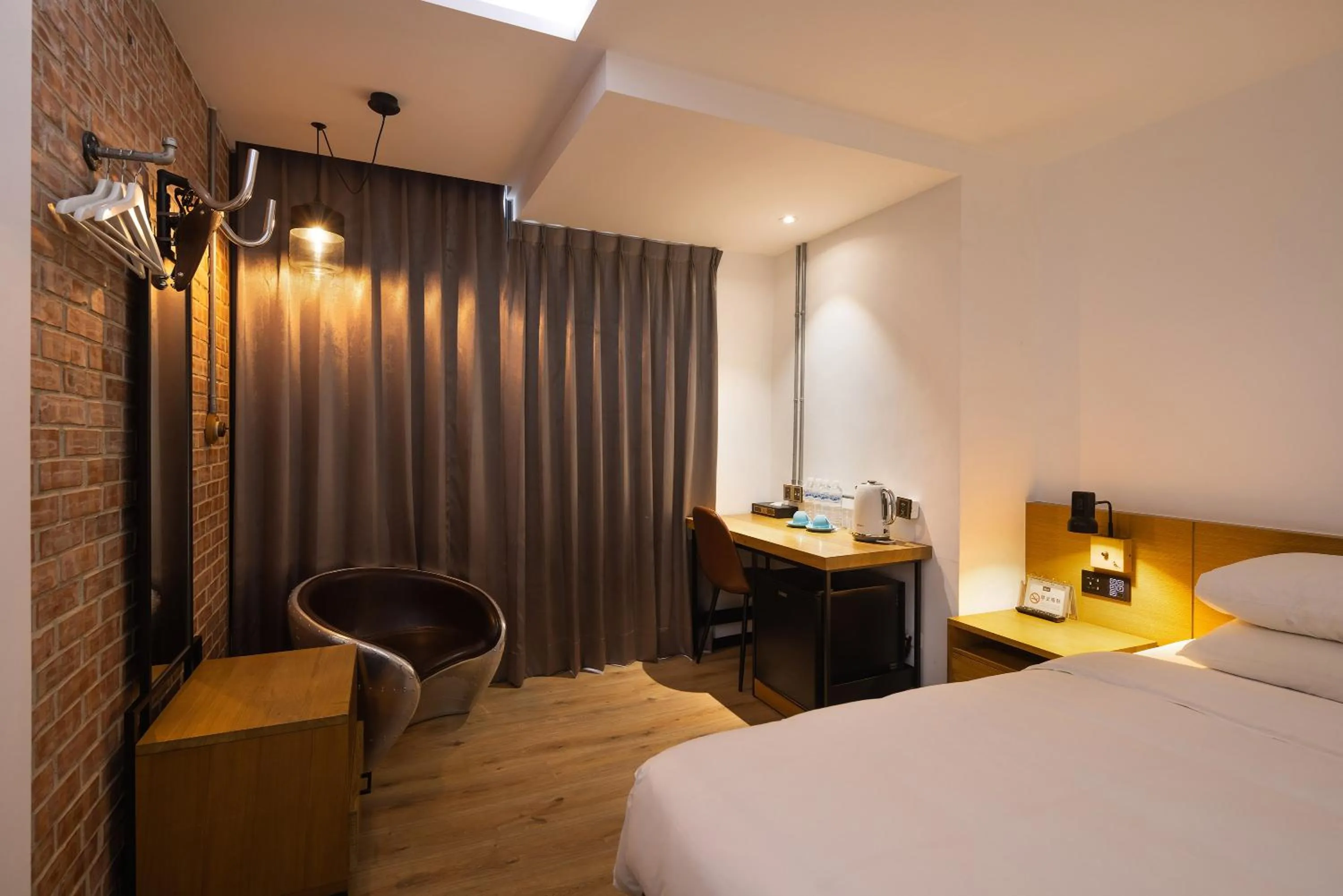 Bed in BlueSky Hotel