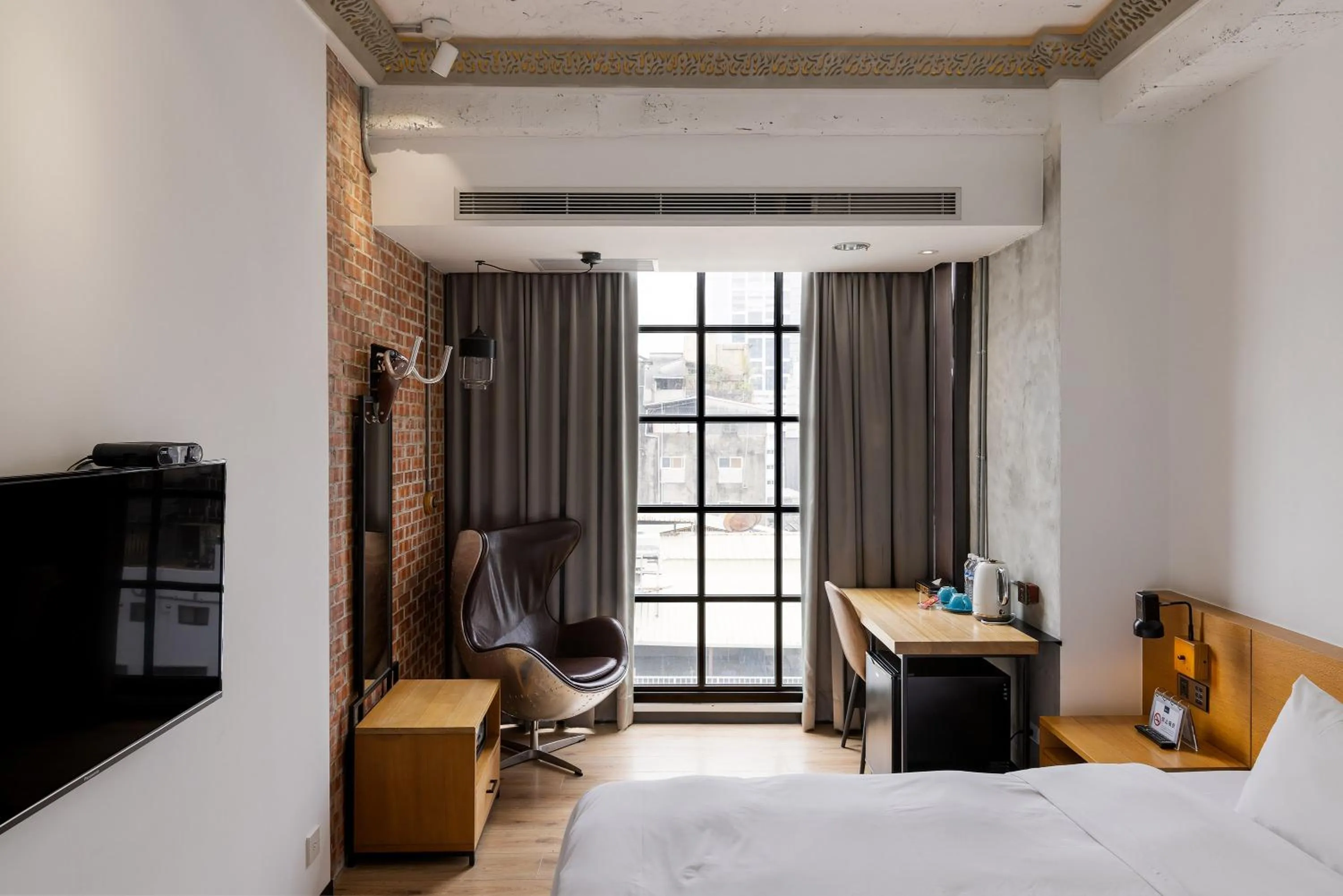 Bed in BlueSky Hotel