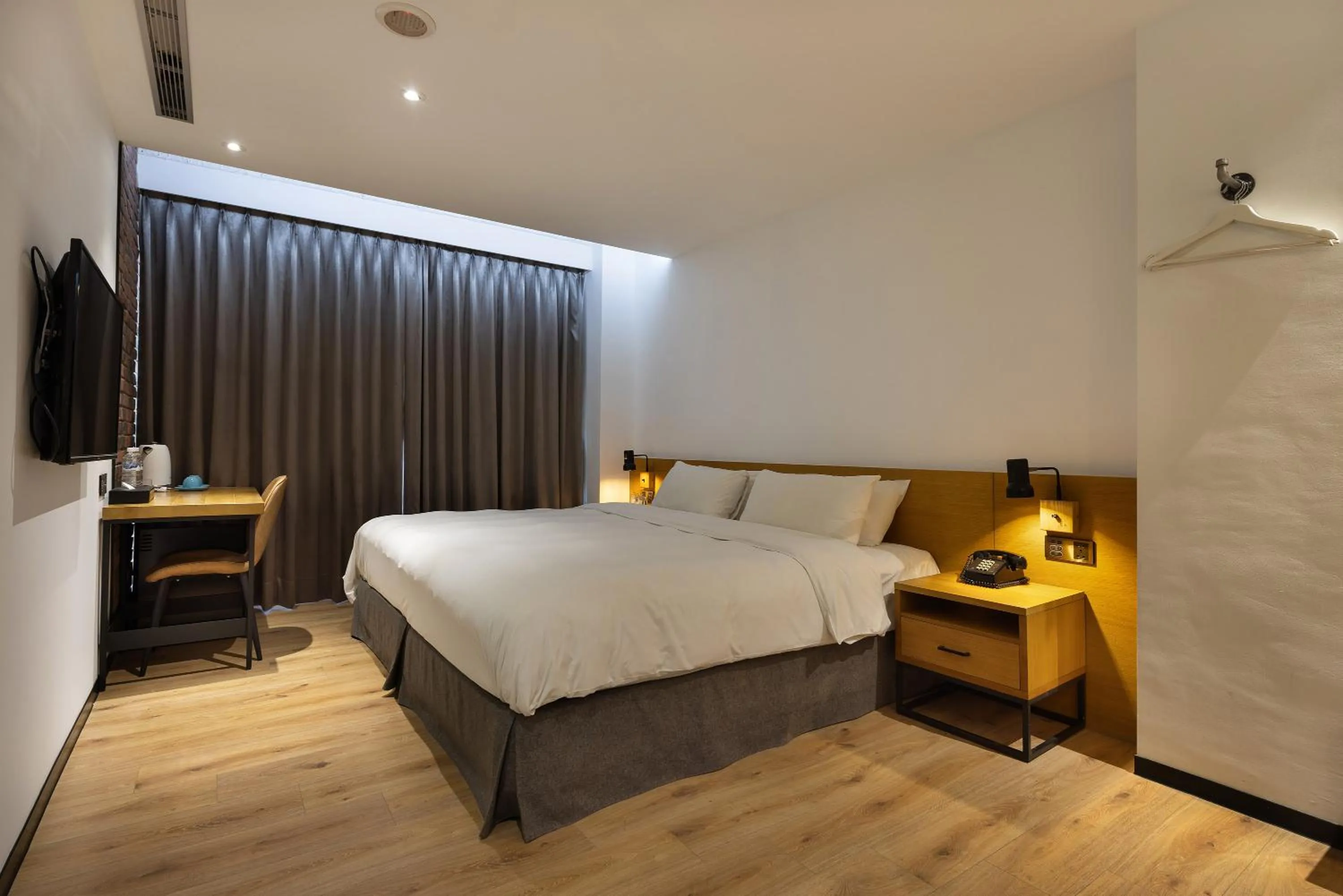 Bed in BlueSky Hotel