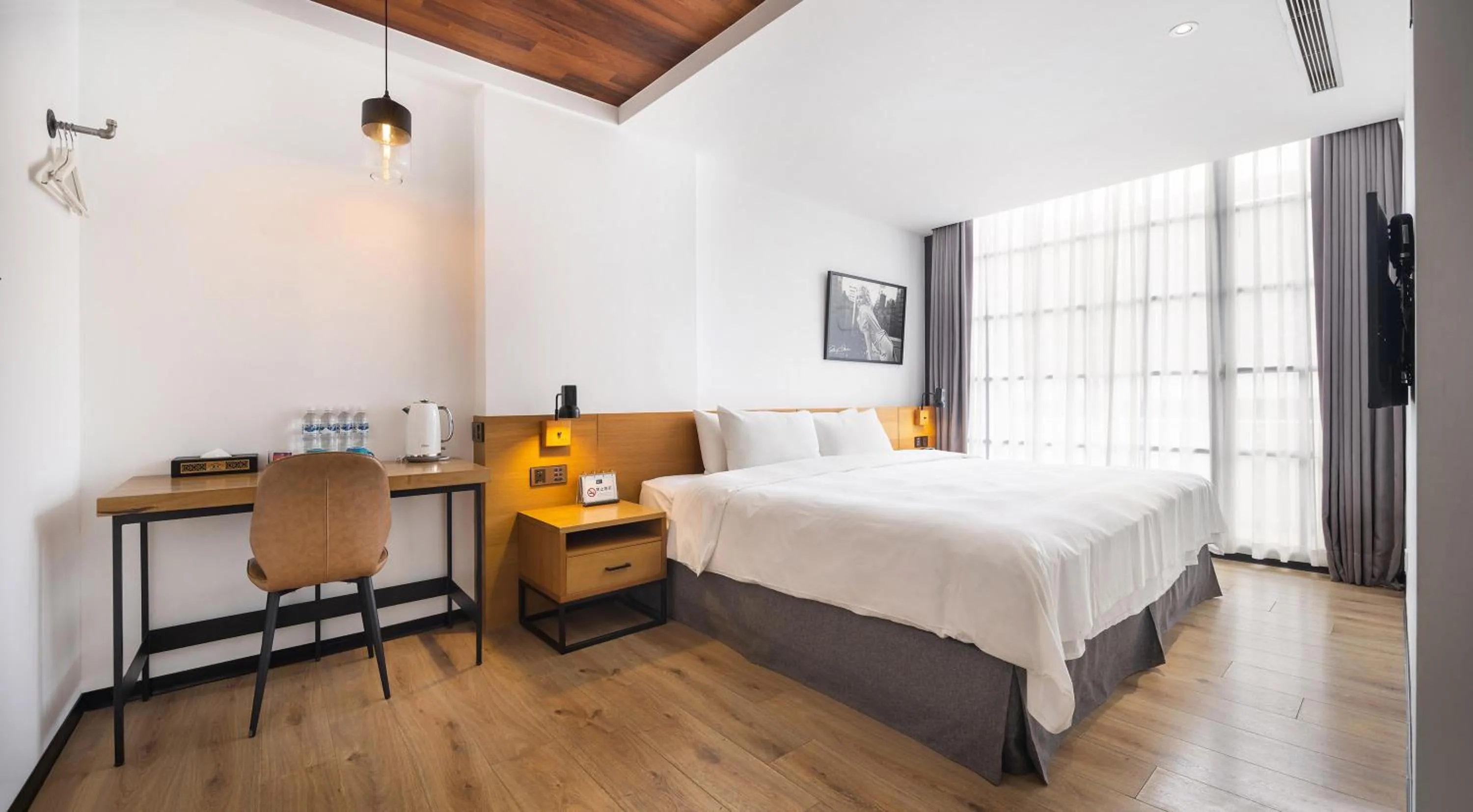 Bed in BlueSky Hotel