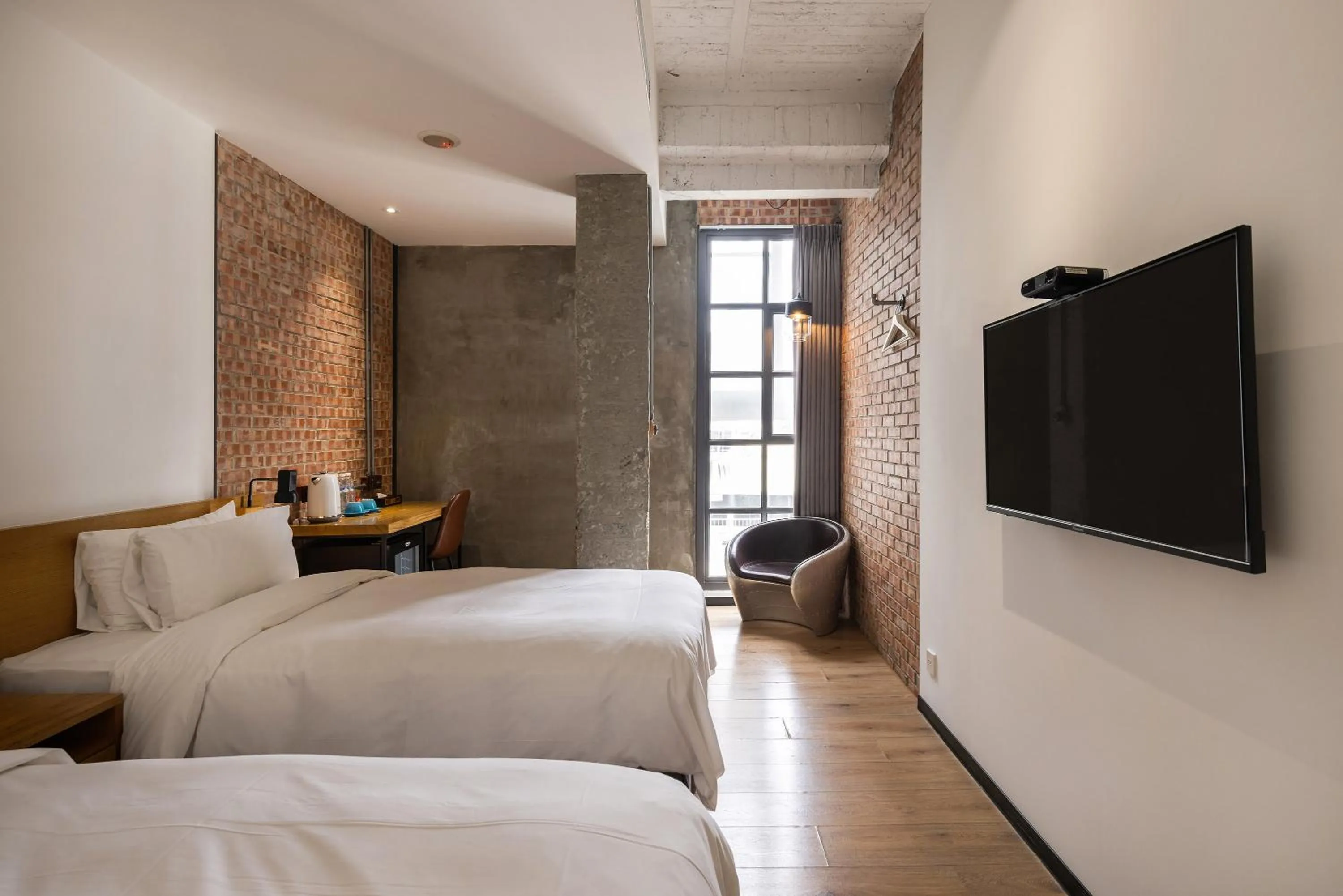 Bed in BlueSky Hotel