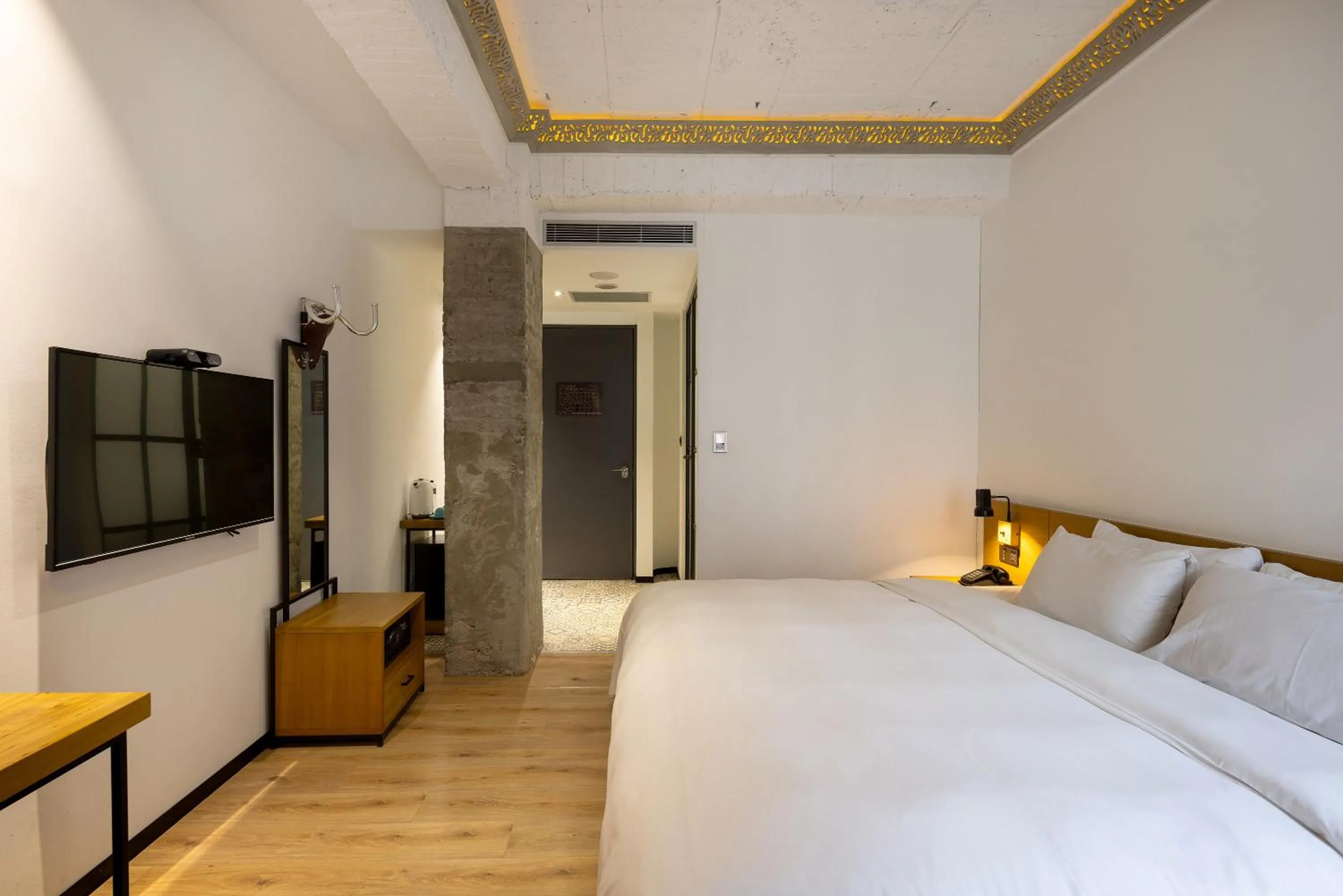 Bed in BlueSky Hotel