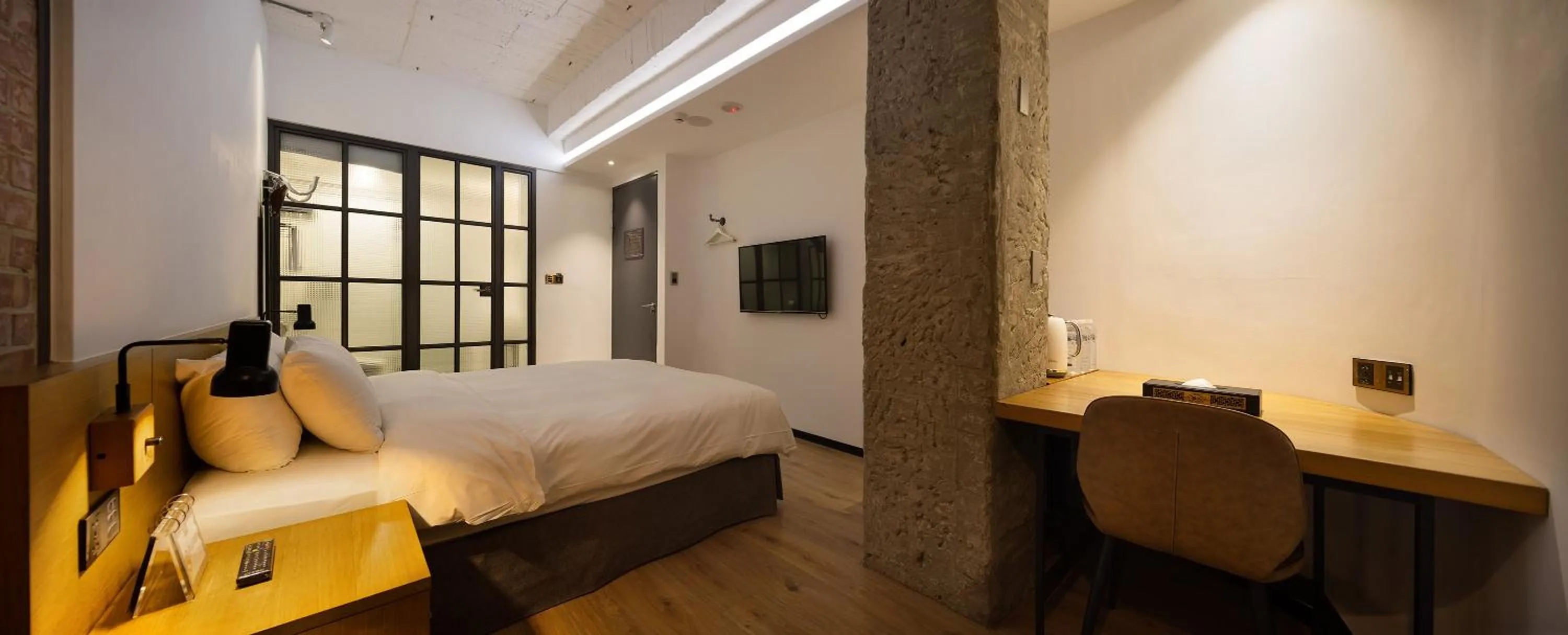 Bed in BlueSky Hotel