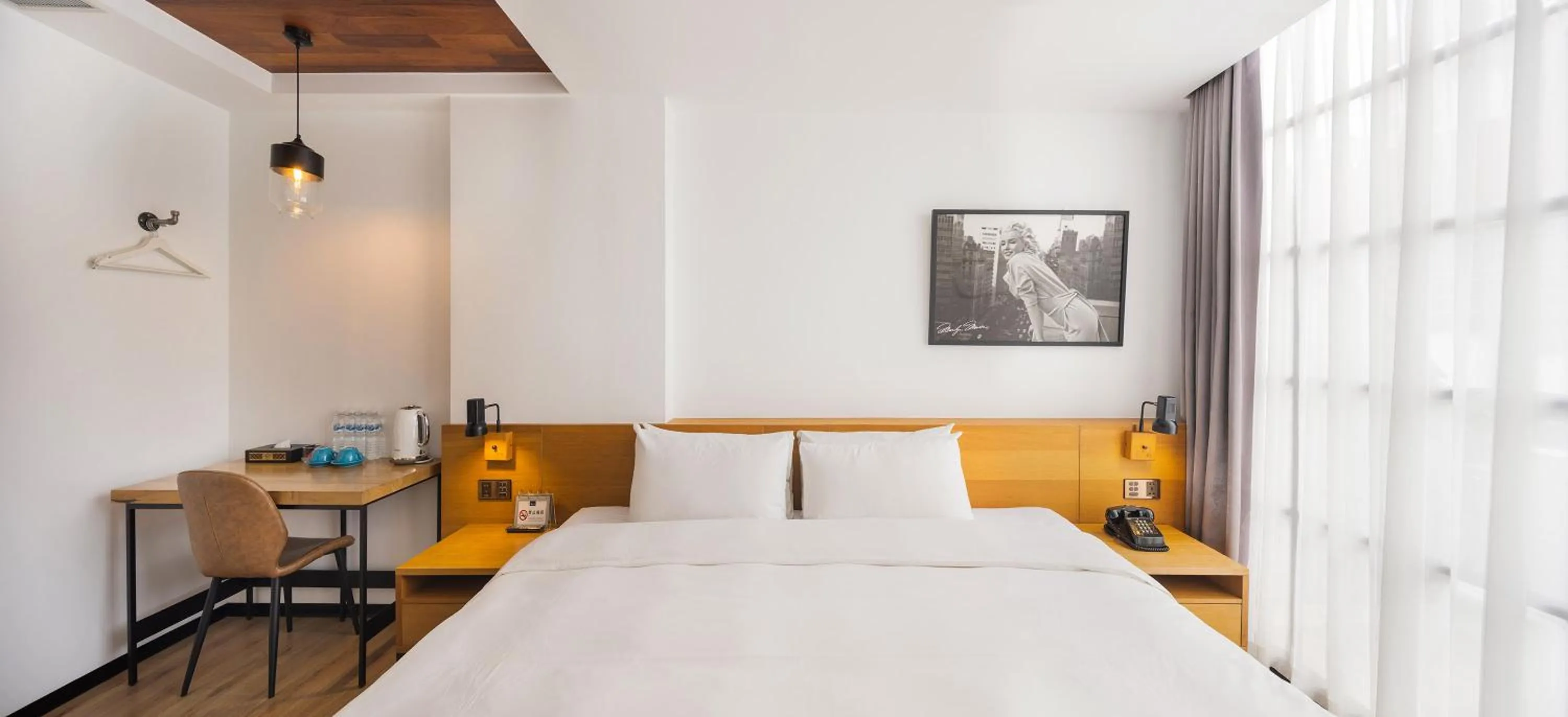 Bed in BlueSky Hotel