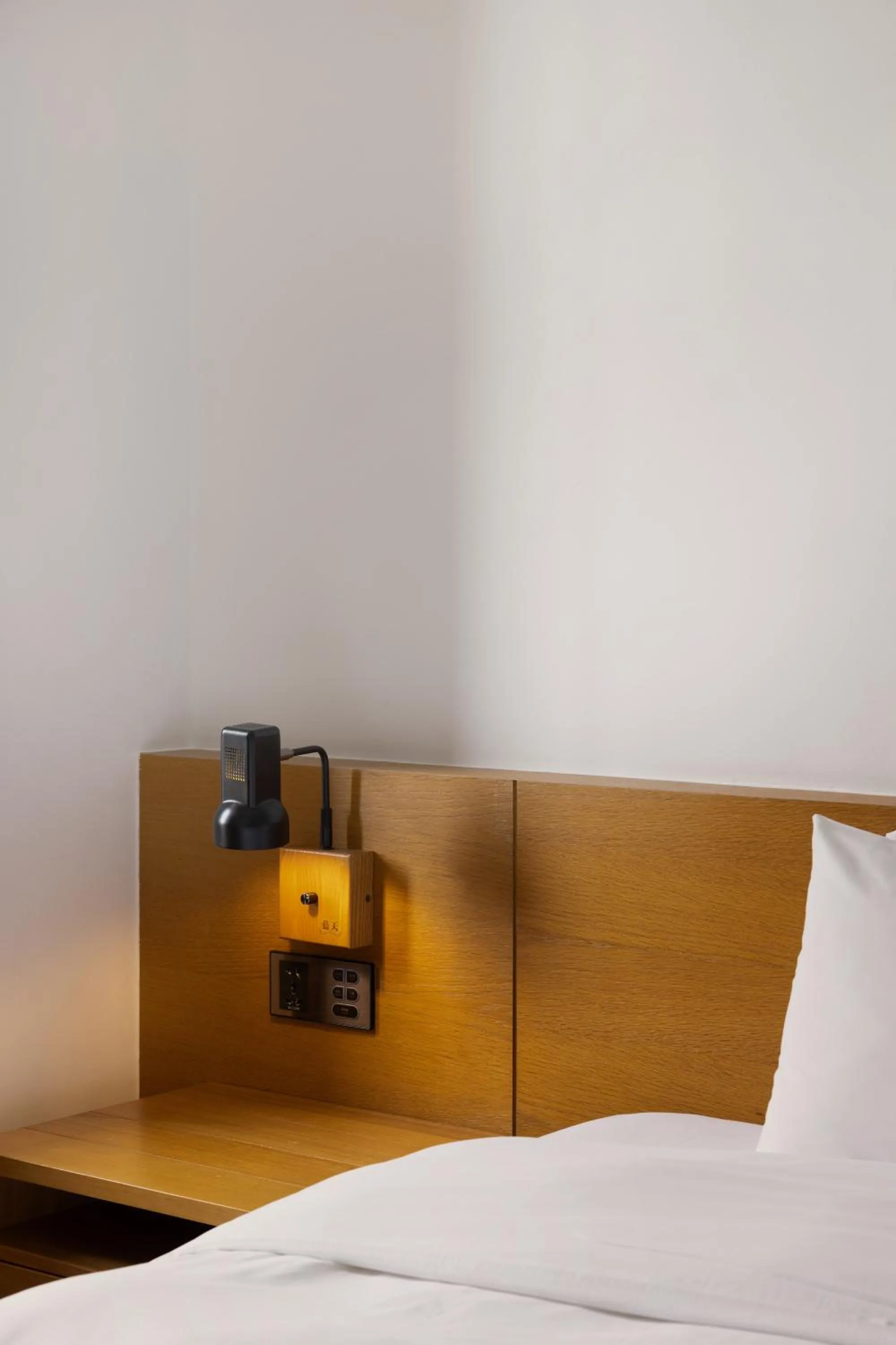 Bed in BlueSky Hotel