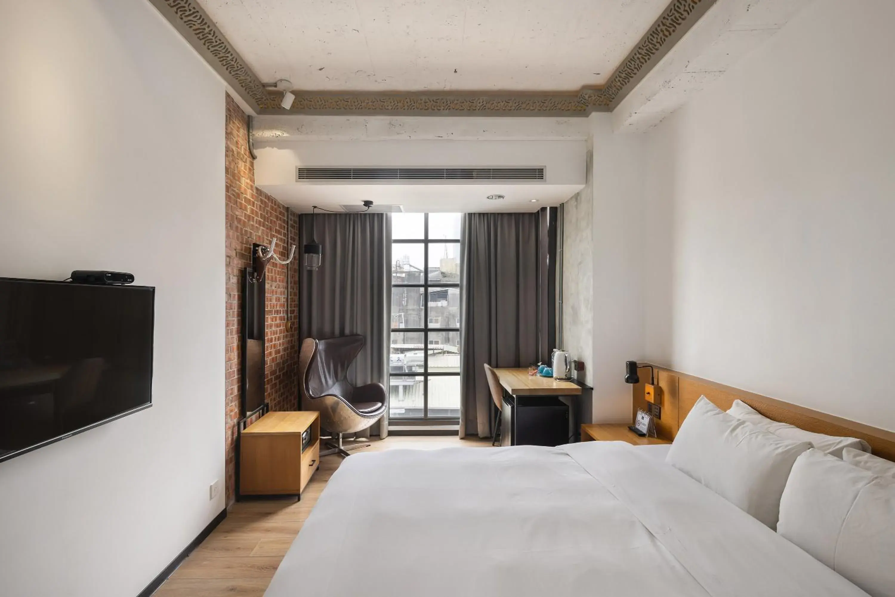 Bed in BlueSky Hotel Bed in BlueSky Hotel