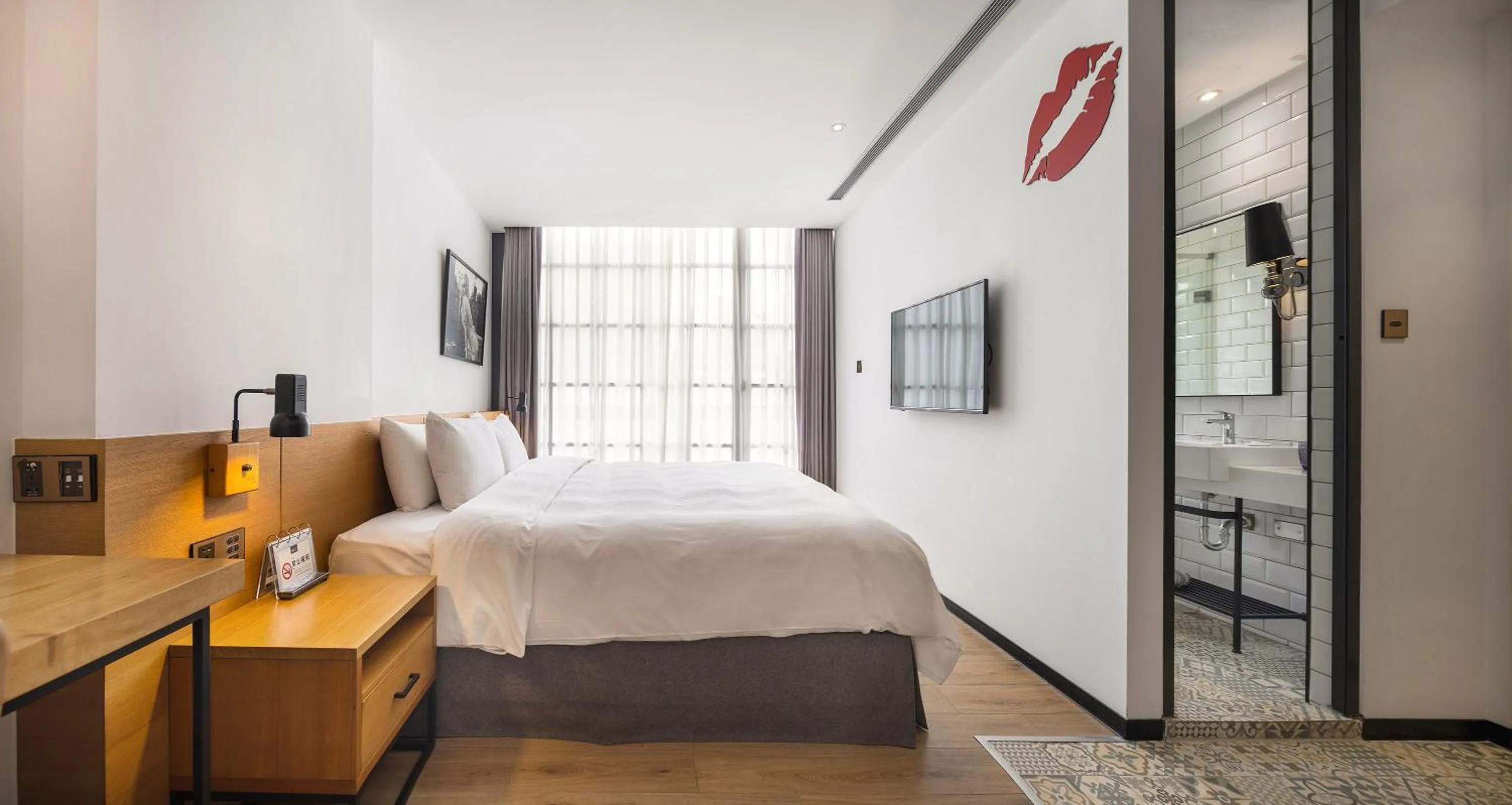 Bed in BlueSky Hotel