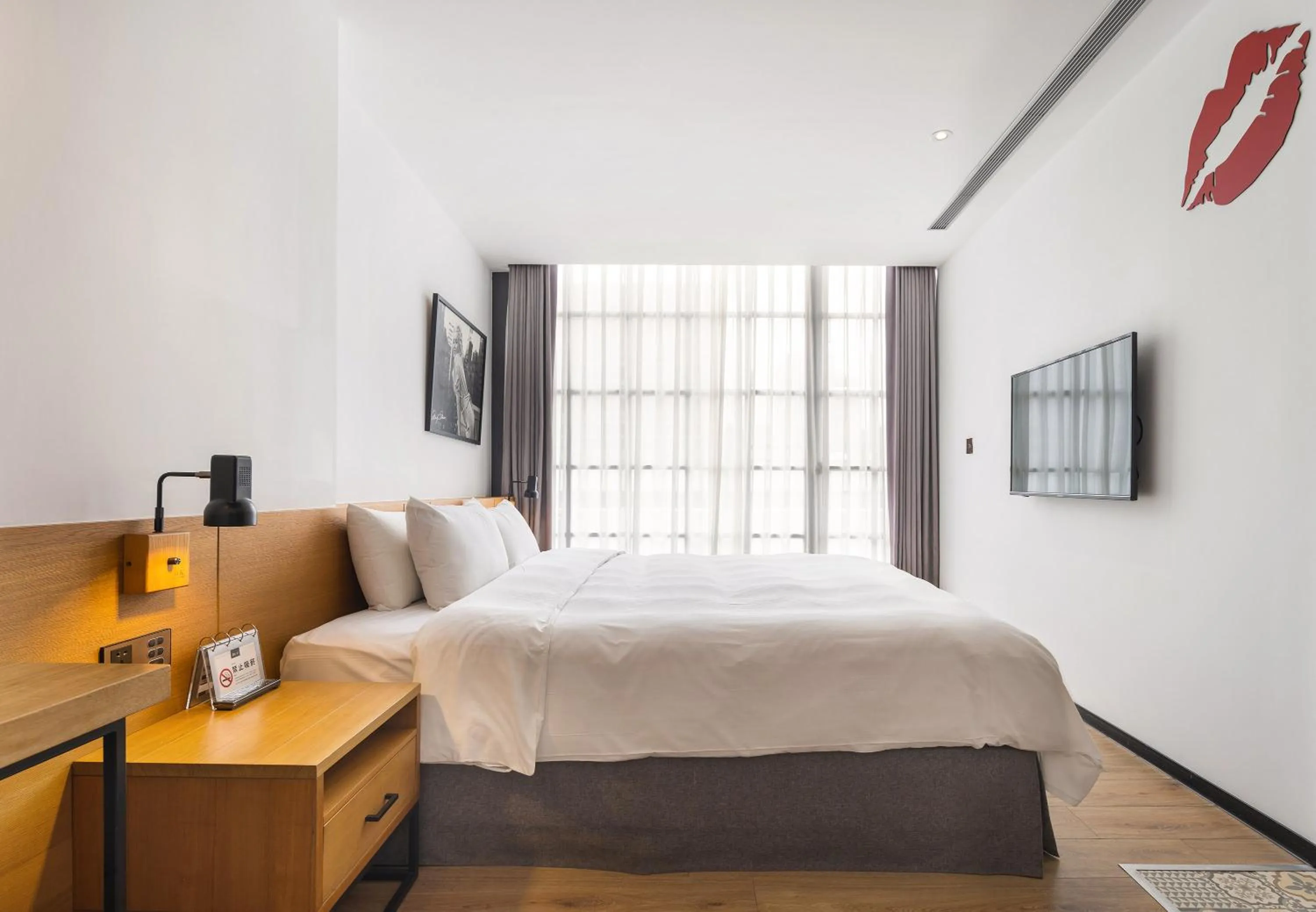 Bed in BlueSky Hotel