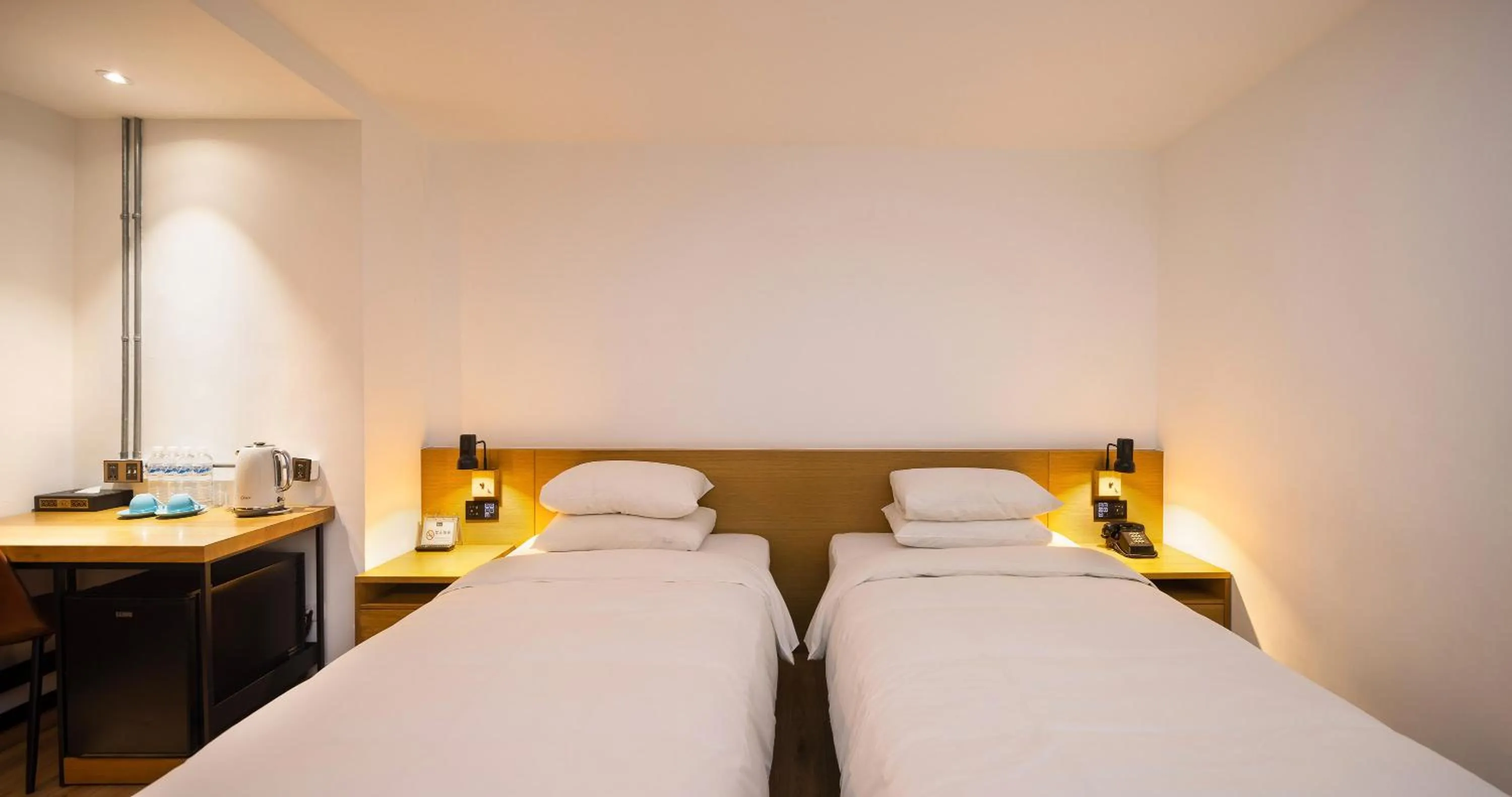 Bed in BlueSky Hotel