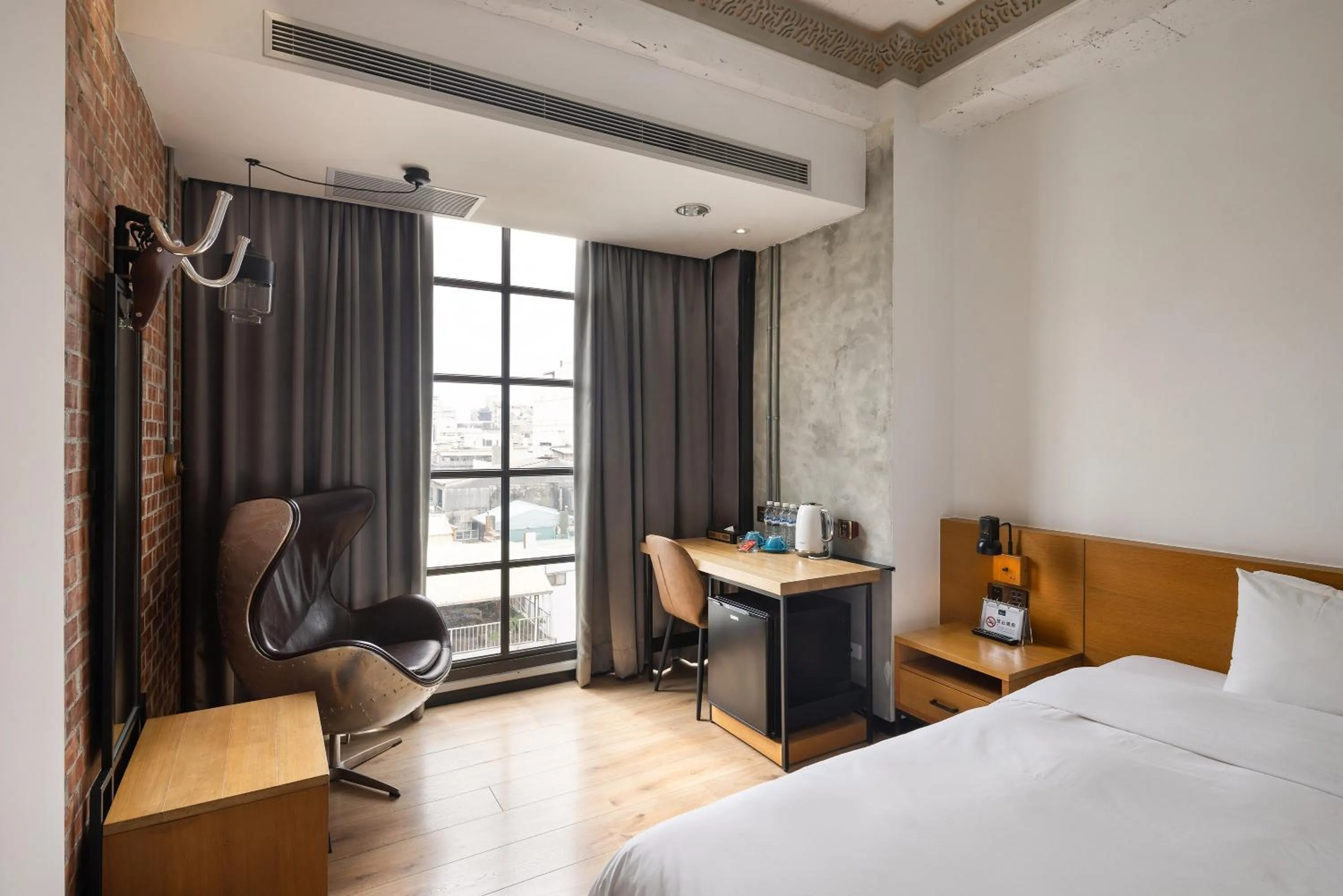 Bed in BlueSky Hotel