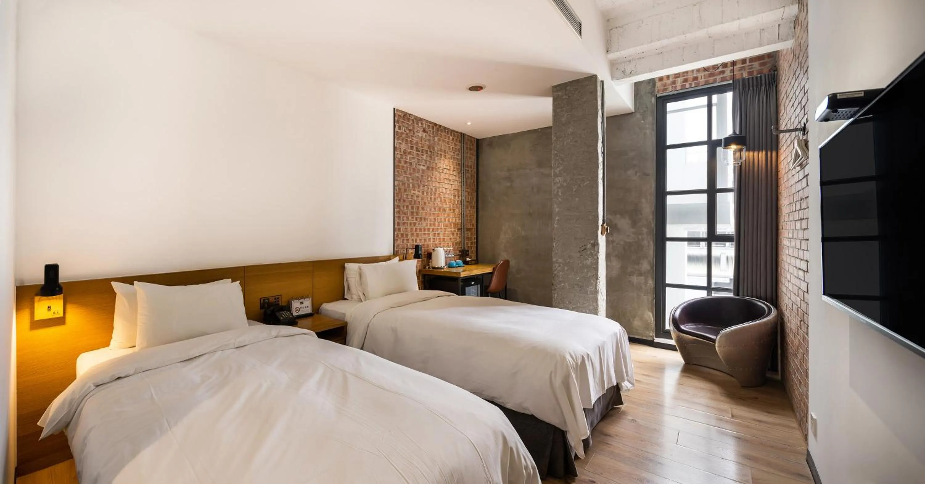 Bed in BlueSky Hotel