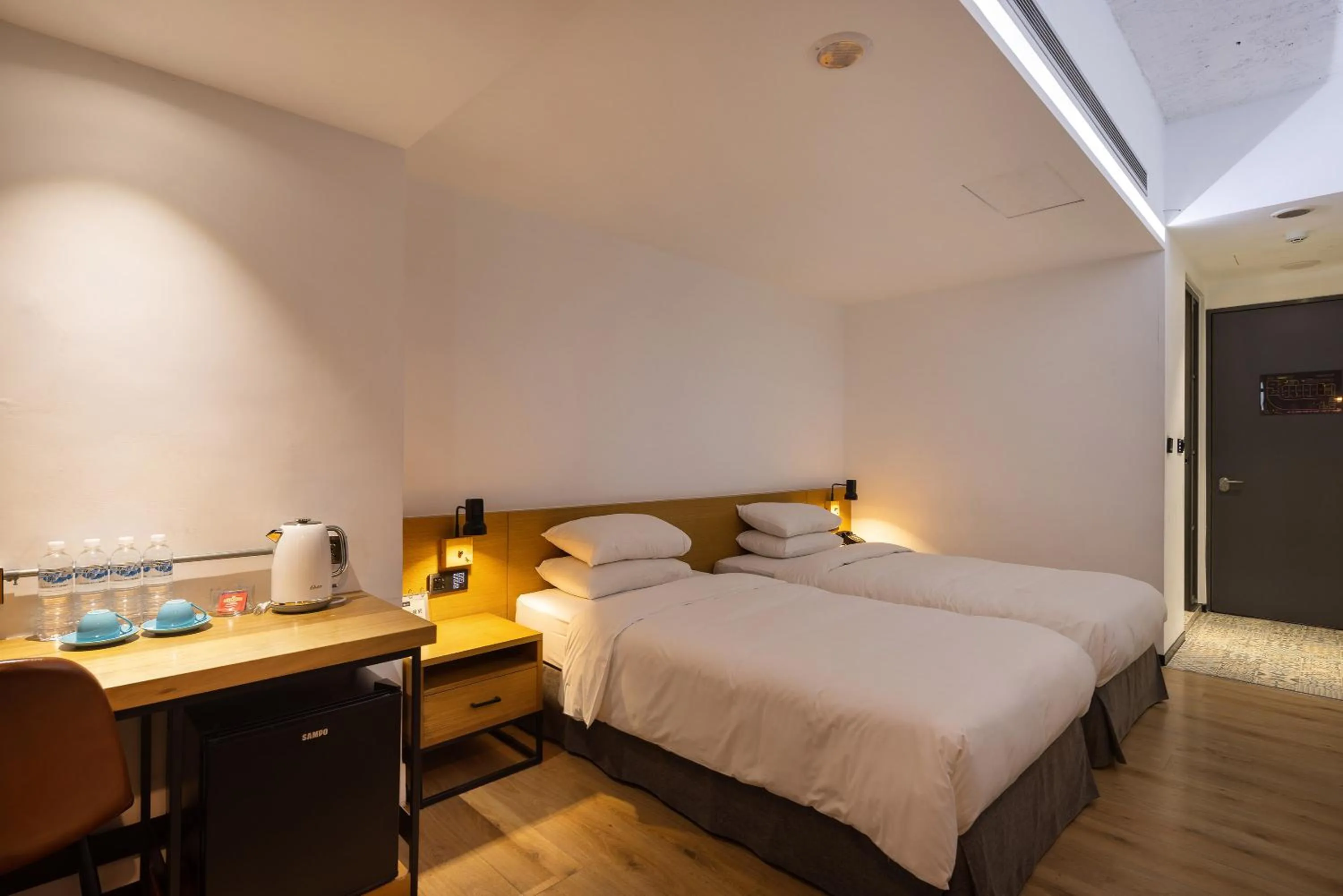 Bed in BlueSky Hotel