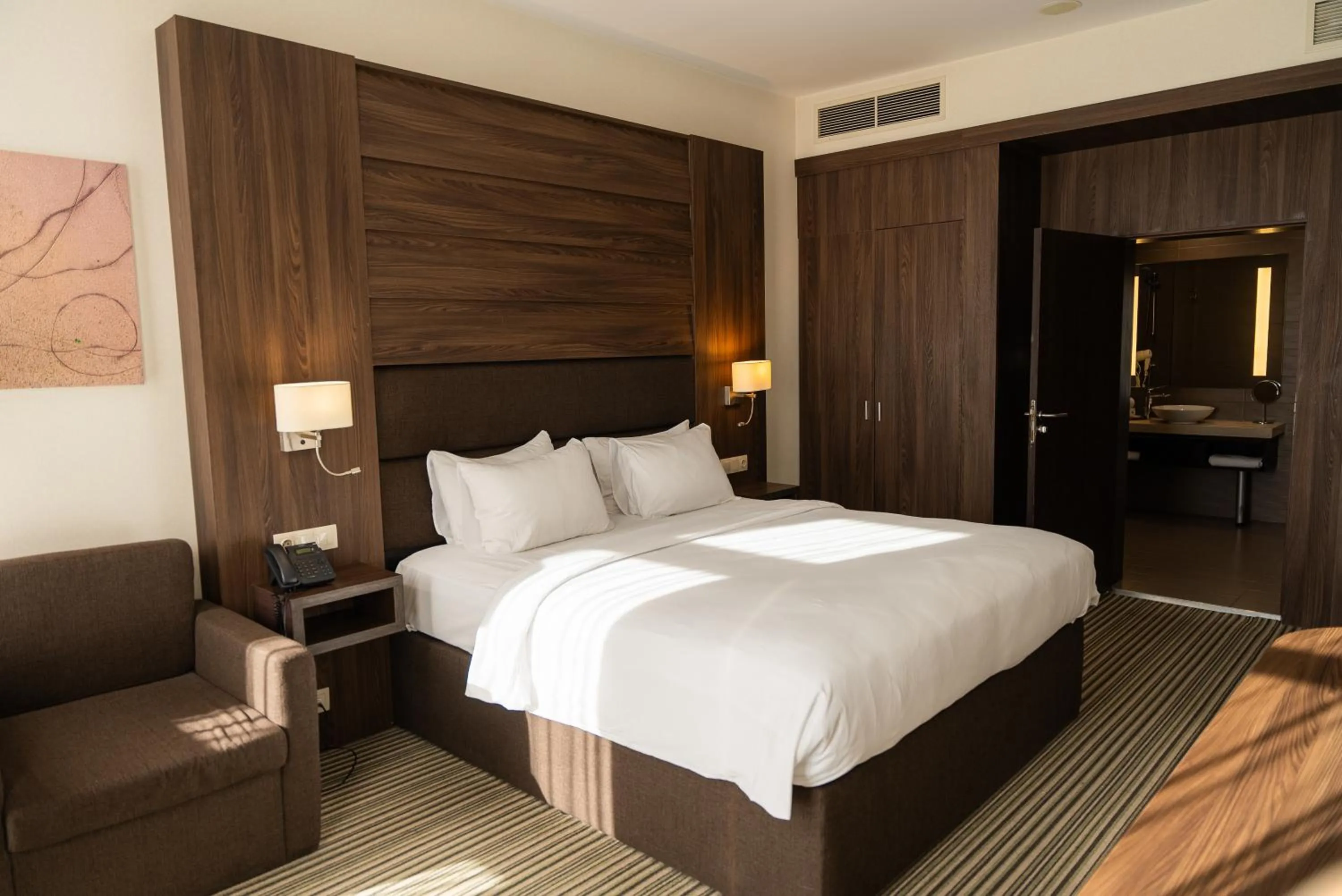 Bed in Premier Sofia Airport Hotel