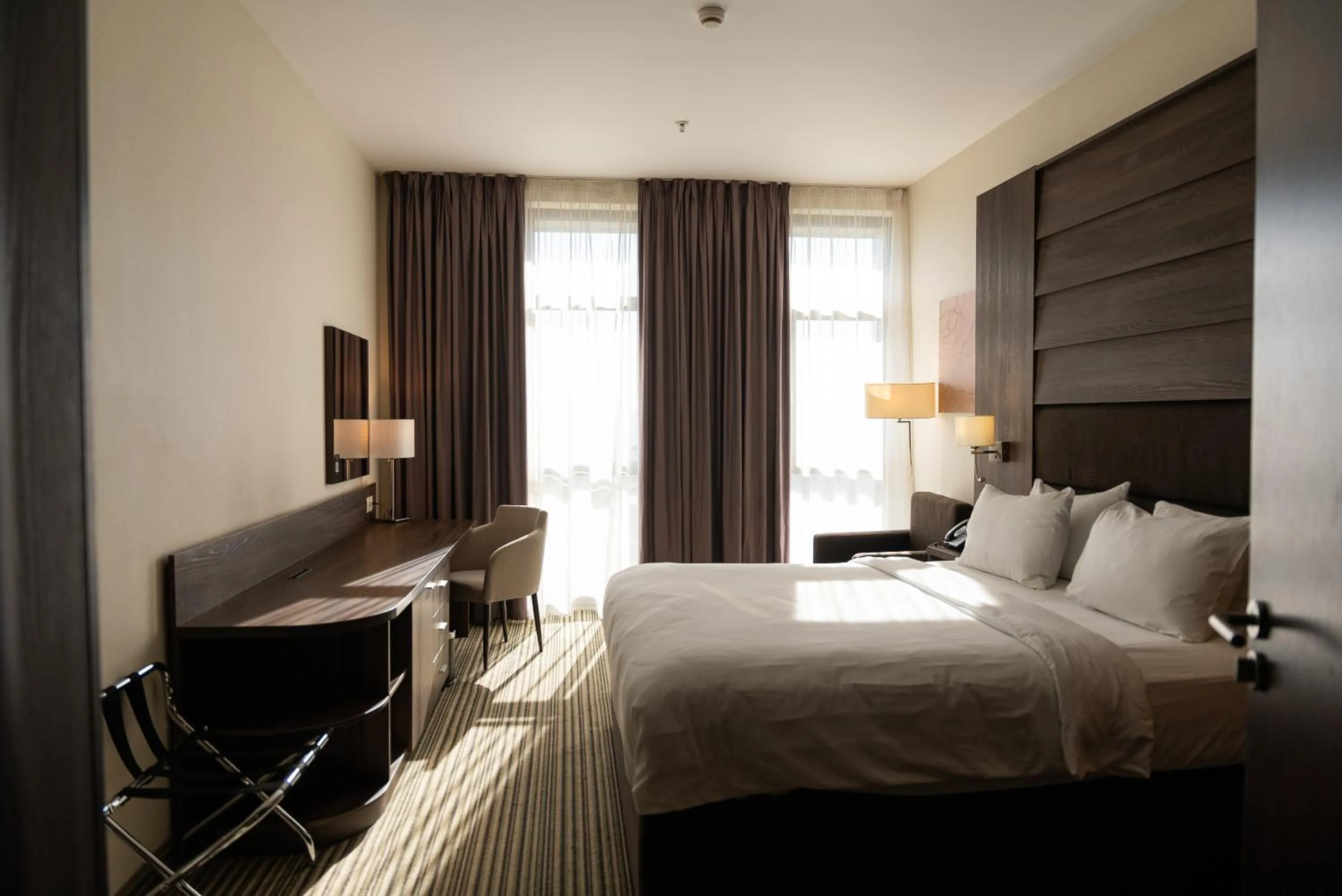 Communal lounge/ TV room, Bed in Premier Sofia Airport Hotel