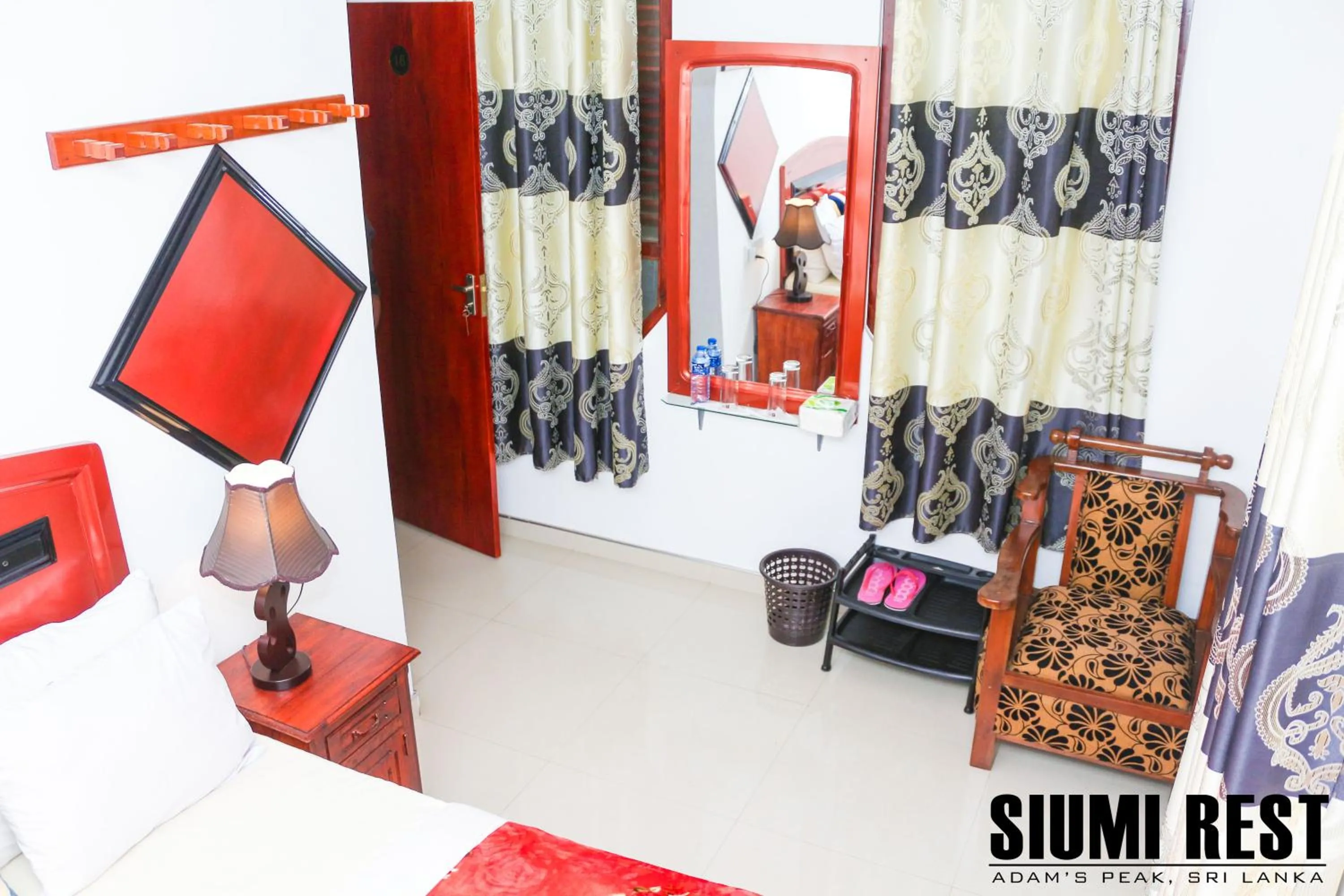Seating area, Bed in Siumi Rest