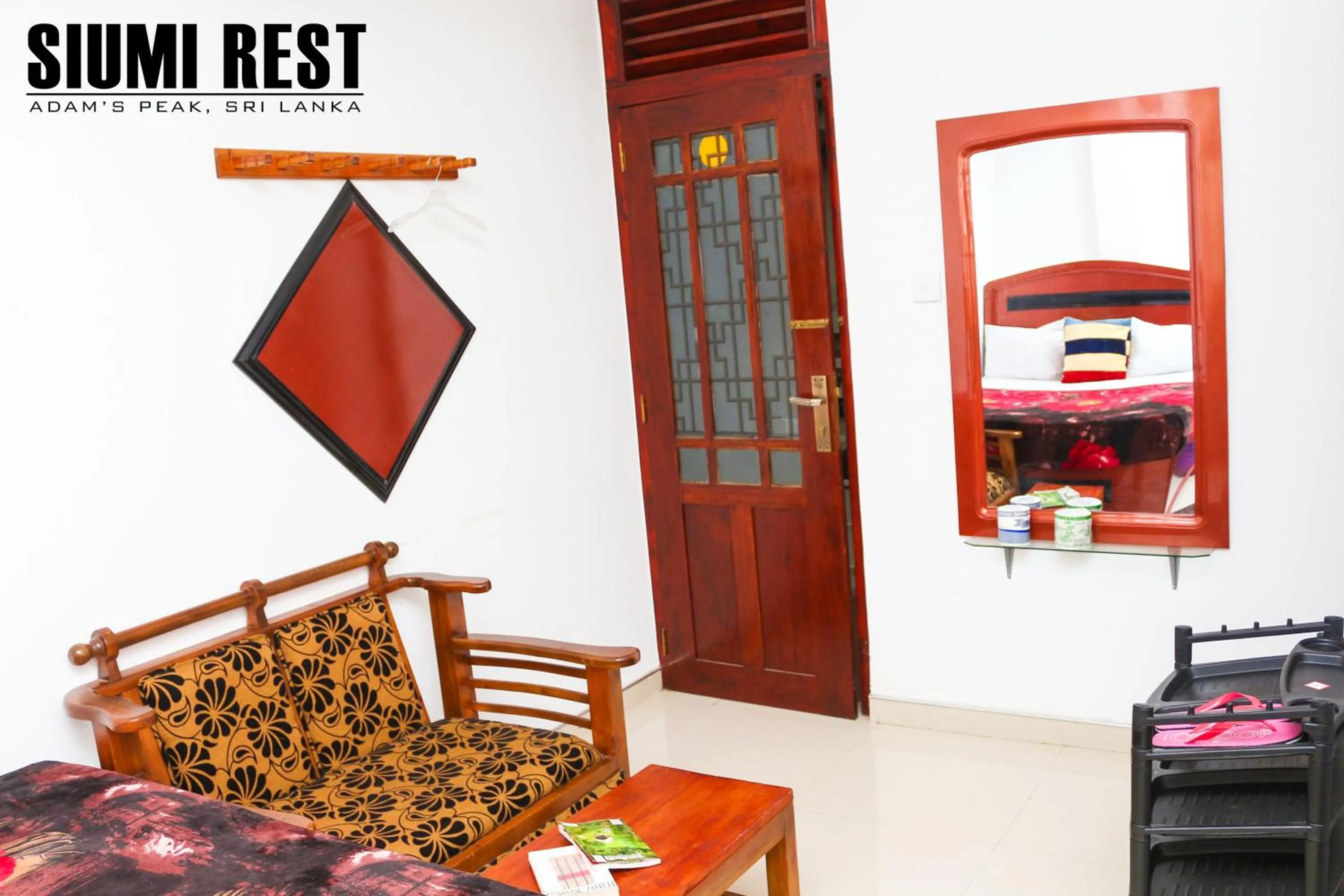 Seating area, Bed in Siumi Rest