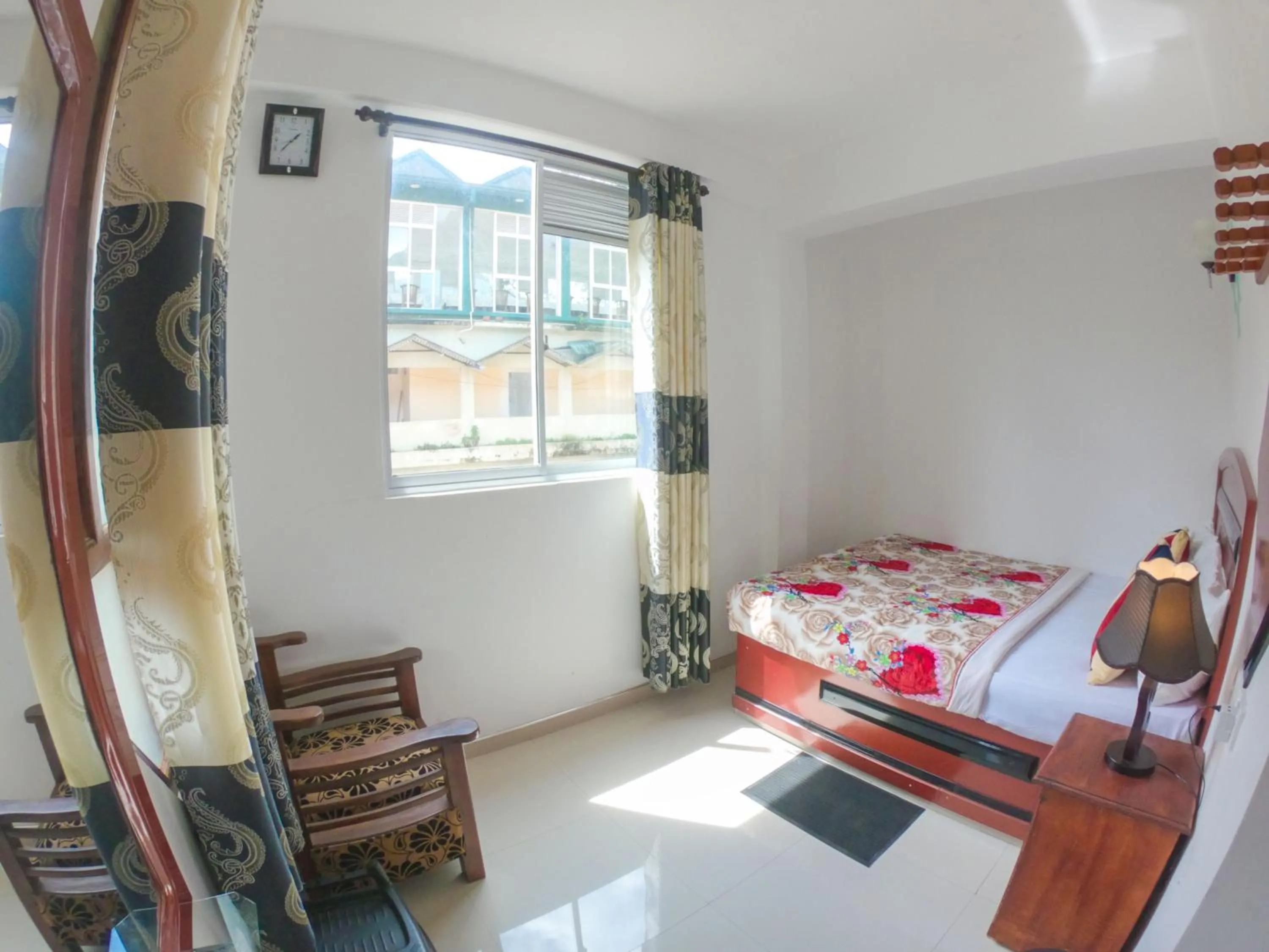 Seating area, Bed in Siumi Rest
