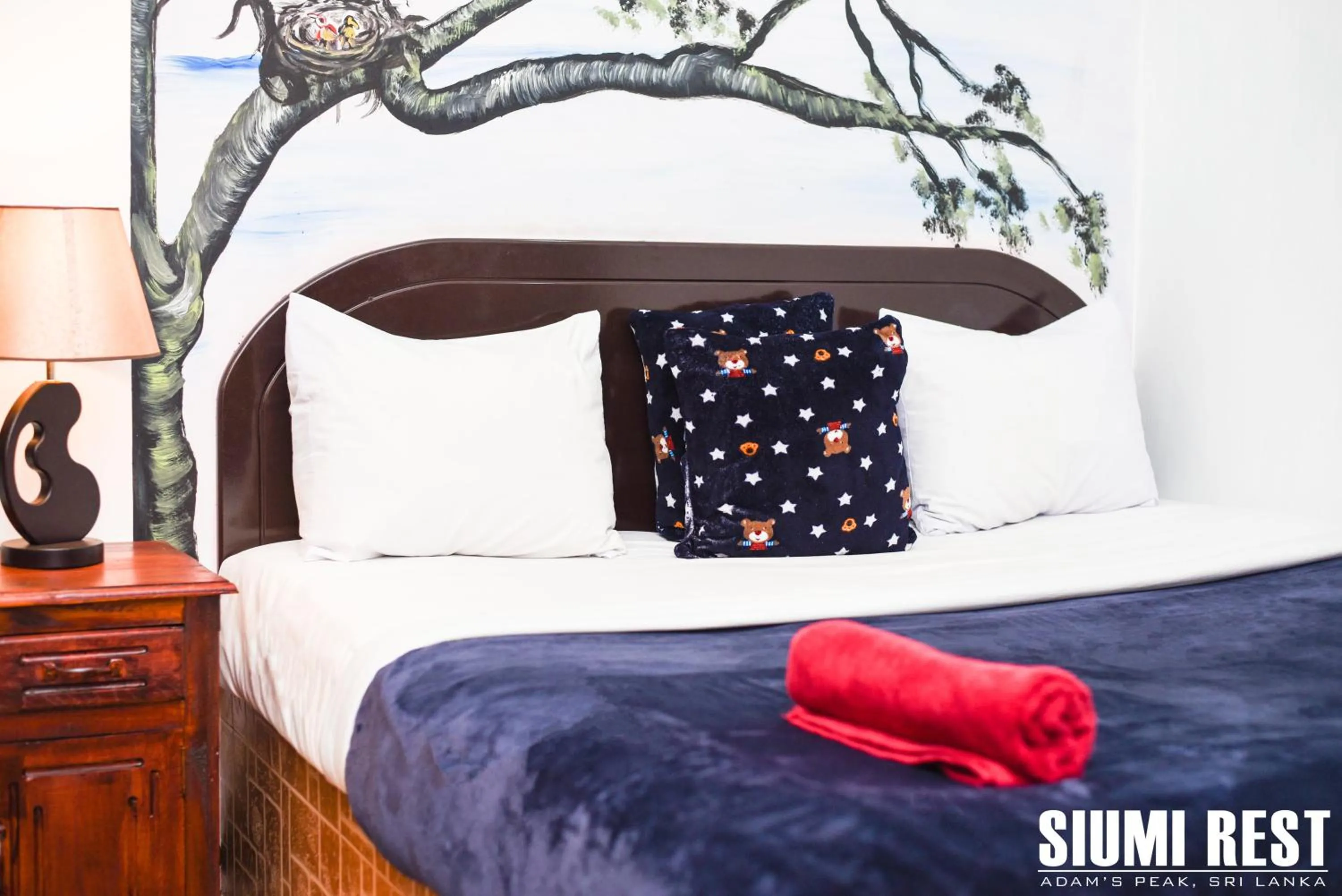 Seating area, Bed in Siumi Rest