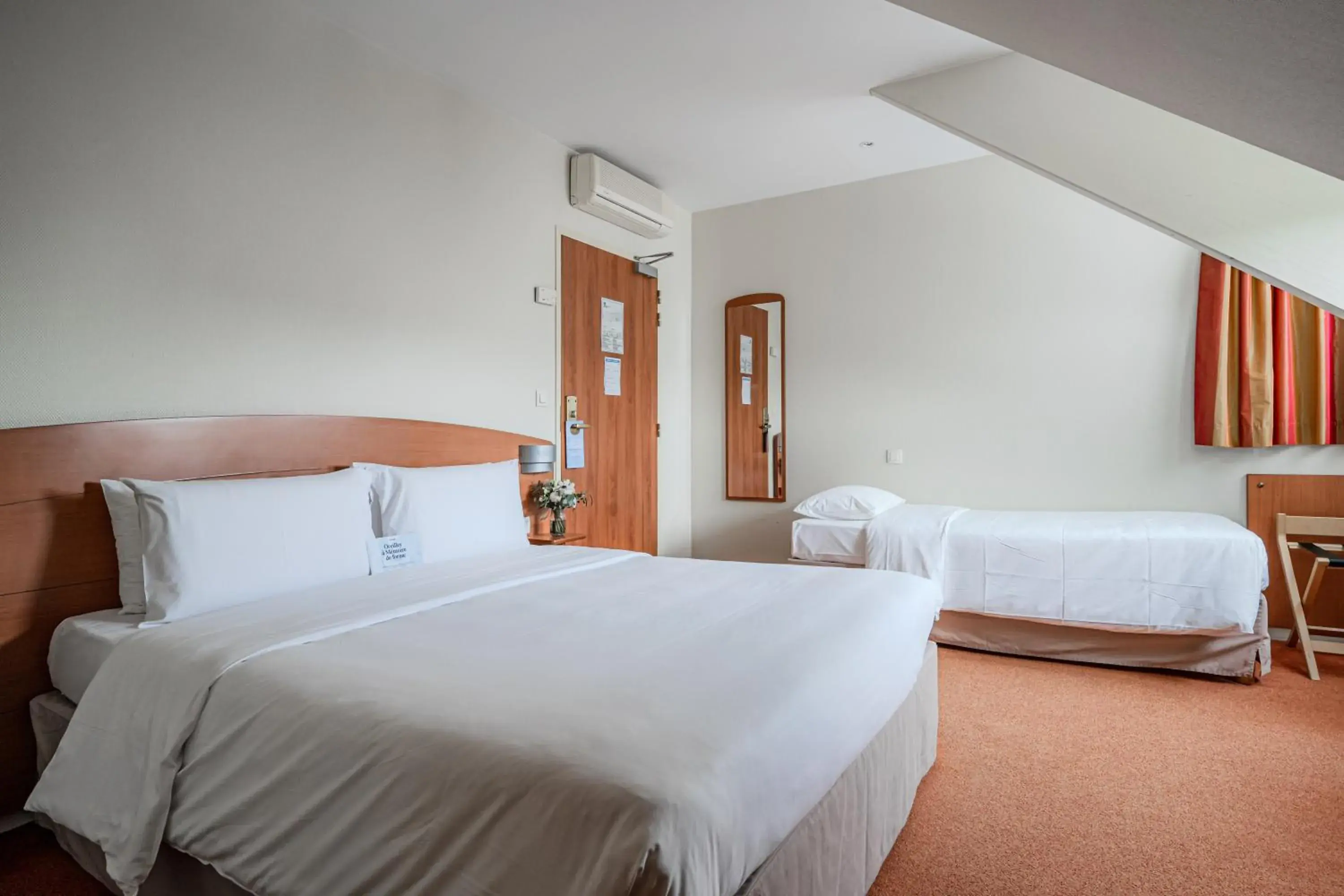 Bed in Kyriad Rennes Nord Hotel Bed in Kyriad Rennes Nord Hotel