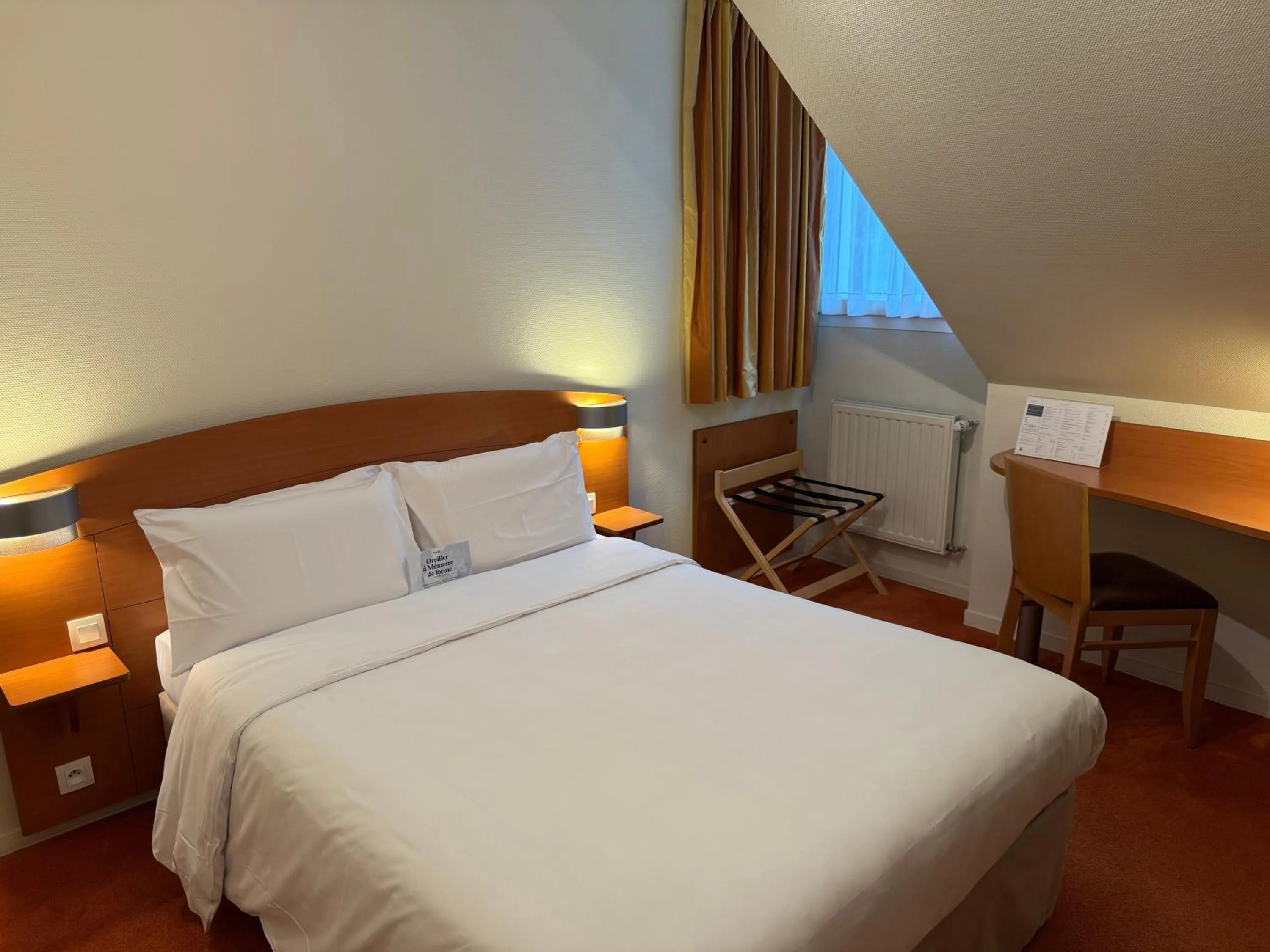 Bed in Kyriad Rennes Nord Hotel