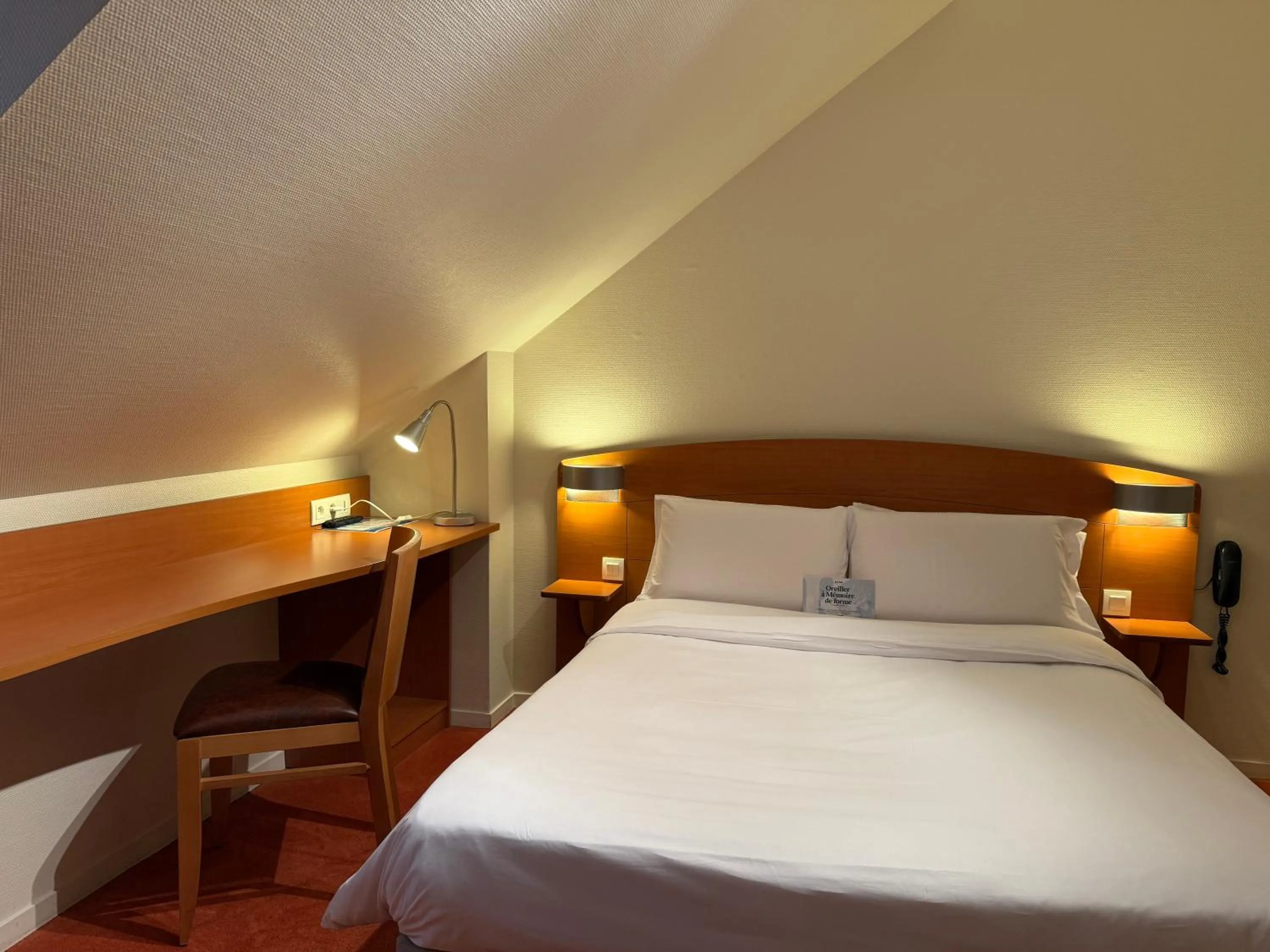 Bed in Kyriad Rennes Nord Hotel