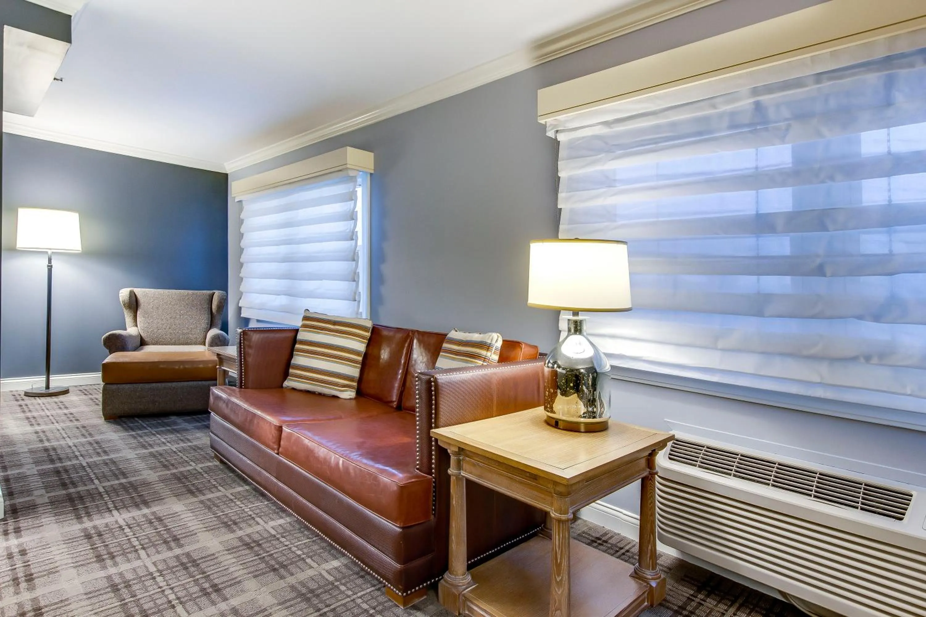 Seating area in The Campbell House Lexington, Curio Collection by Hilton