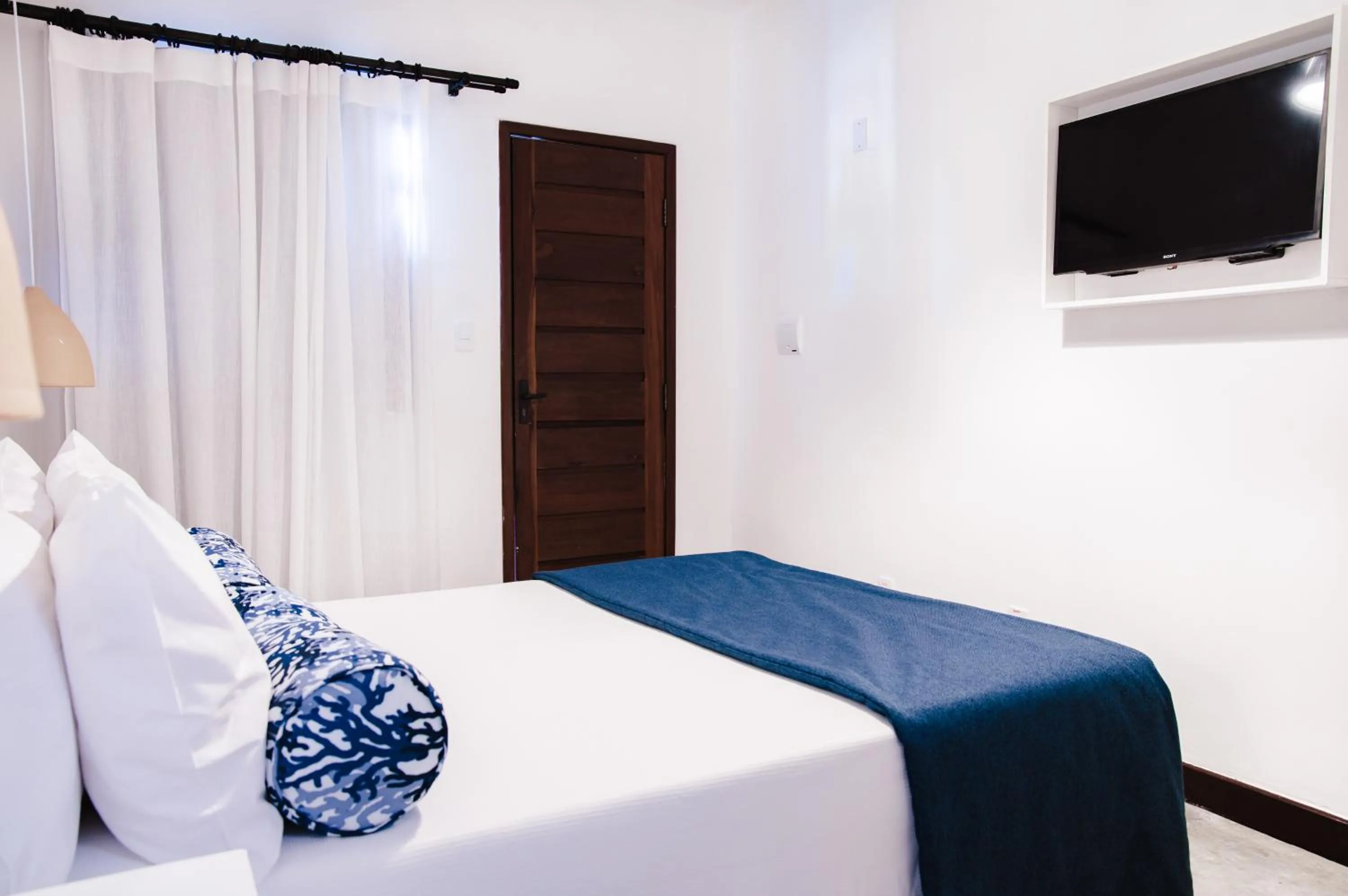 Bed in Pousada Aldeola by Slaviero Hotéis