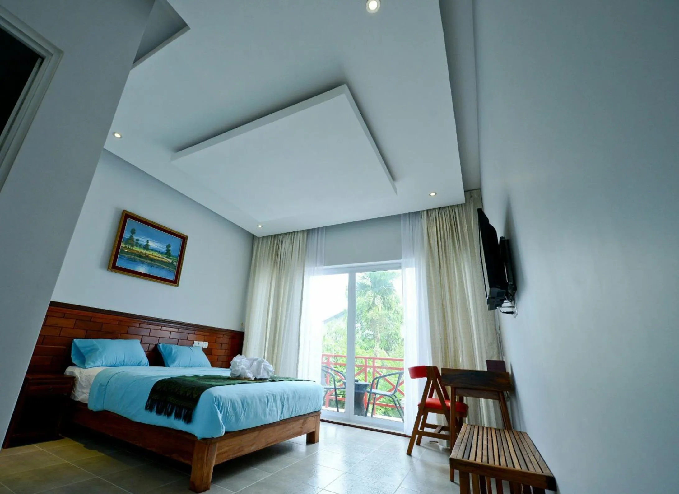 Balcony/Terrace, Bed in Mowin Boutique Hotel & Residence