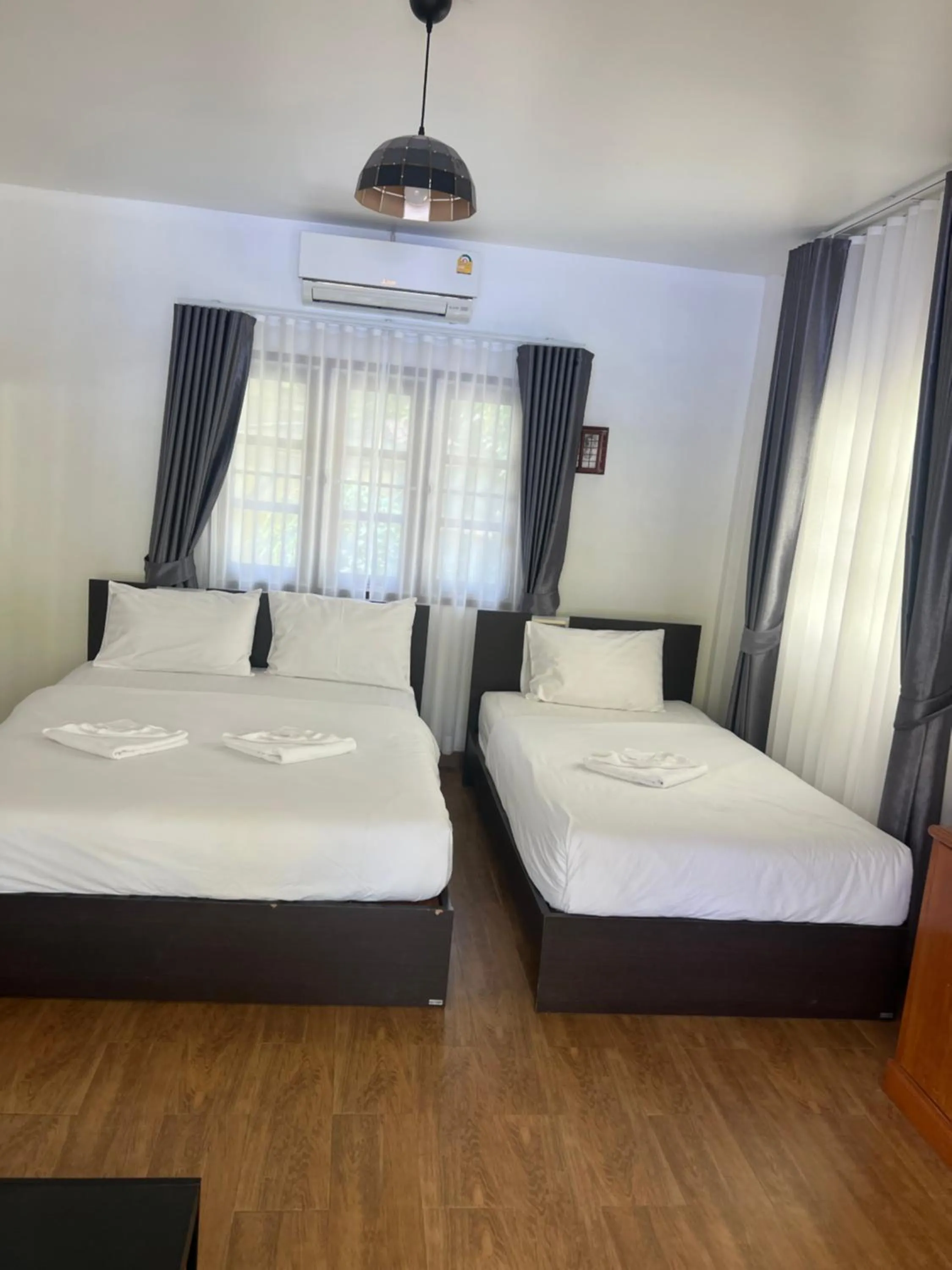 Bed in Thipburee Resort