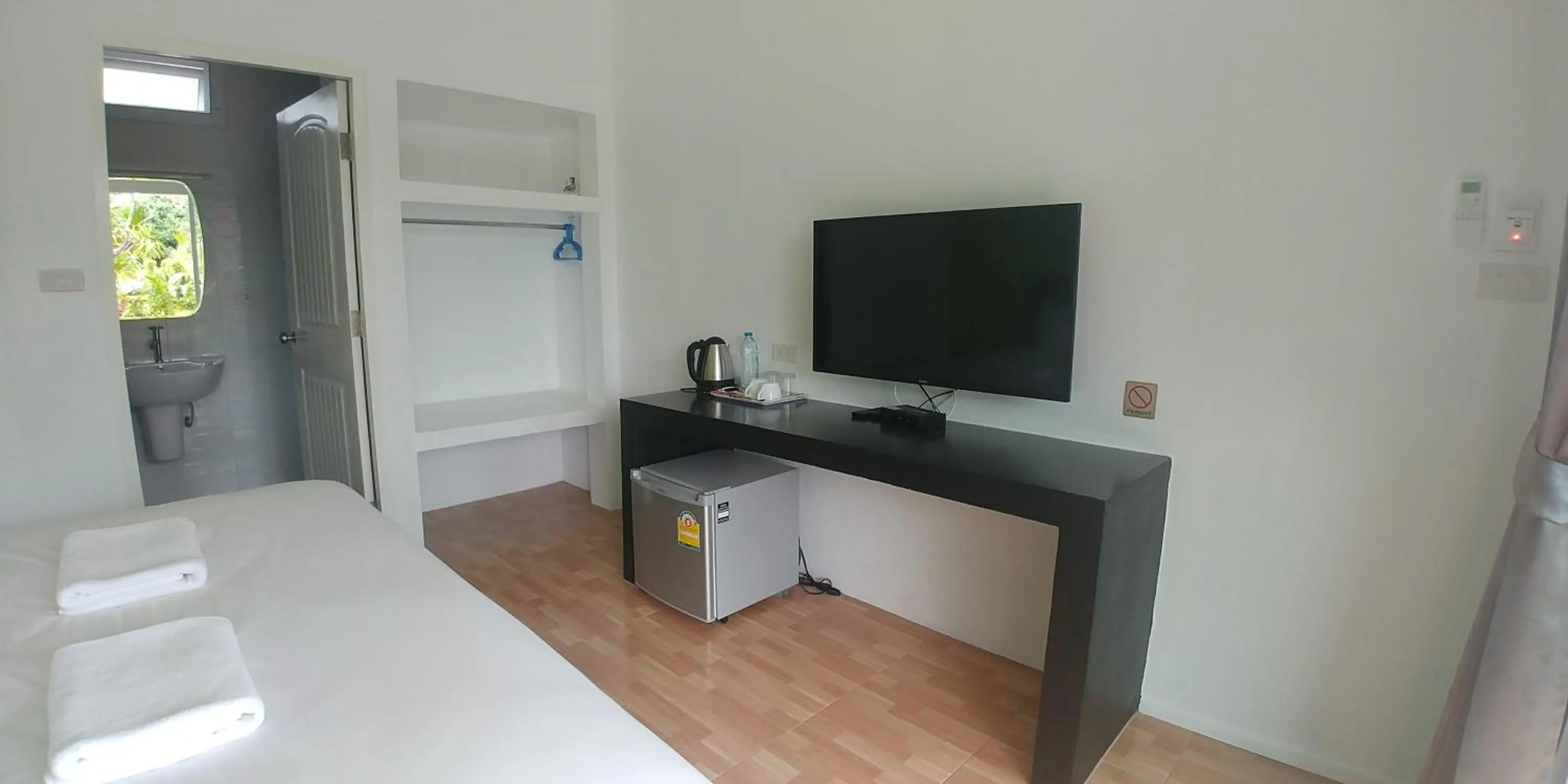 Bed in Thipburee Resort